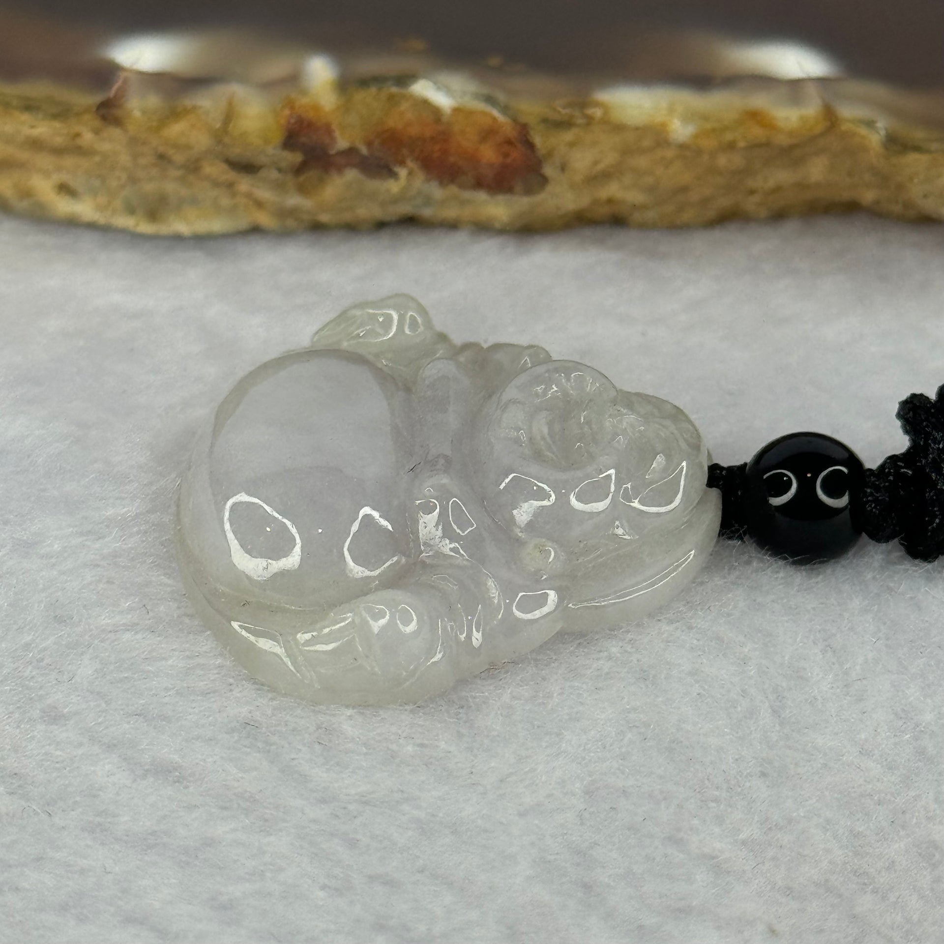 Type A Light Lavender Jadeite Milo Buddha Pendent 7.06g 25.4 by 28.3 by 3.0mm - Huangs Jadeite and Jewelry Pte Ltd