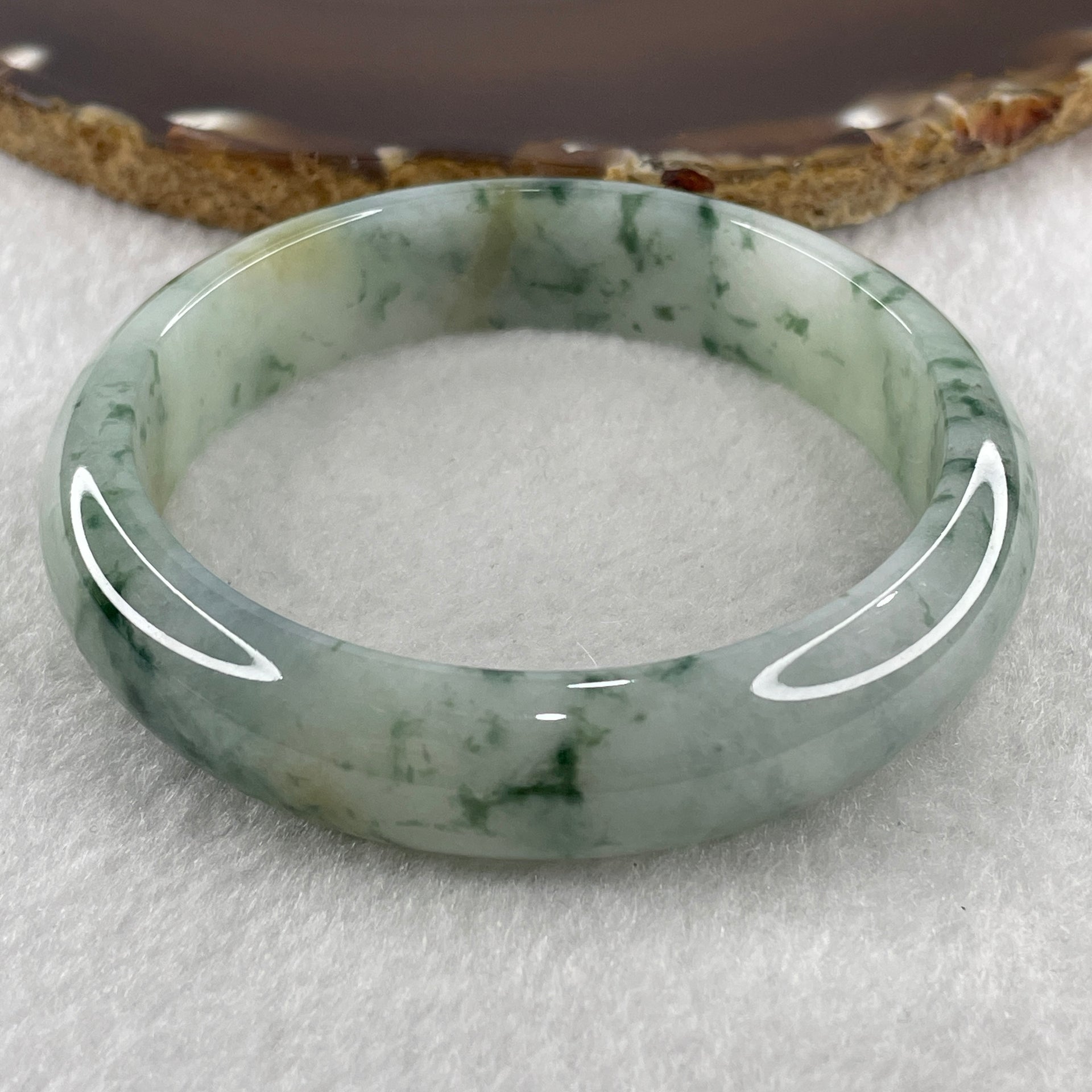 Certified Natural Type A Jelly Light Green with Spicy Green Piao Hua Jadeite Bangle 57.20g Internal Diameter 58.4mm 14.1 by 7.7mm (Perfect) - Huangs Jadeite and Jewelry Pte Ltd