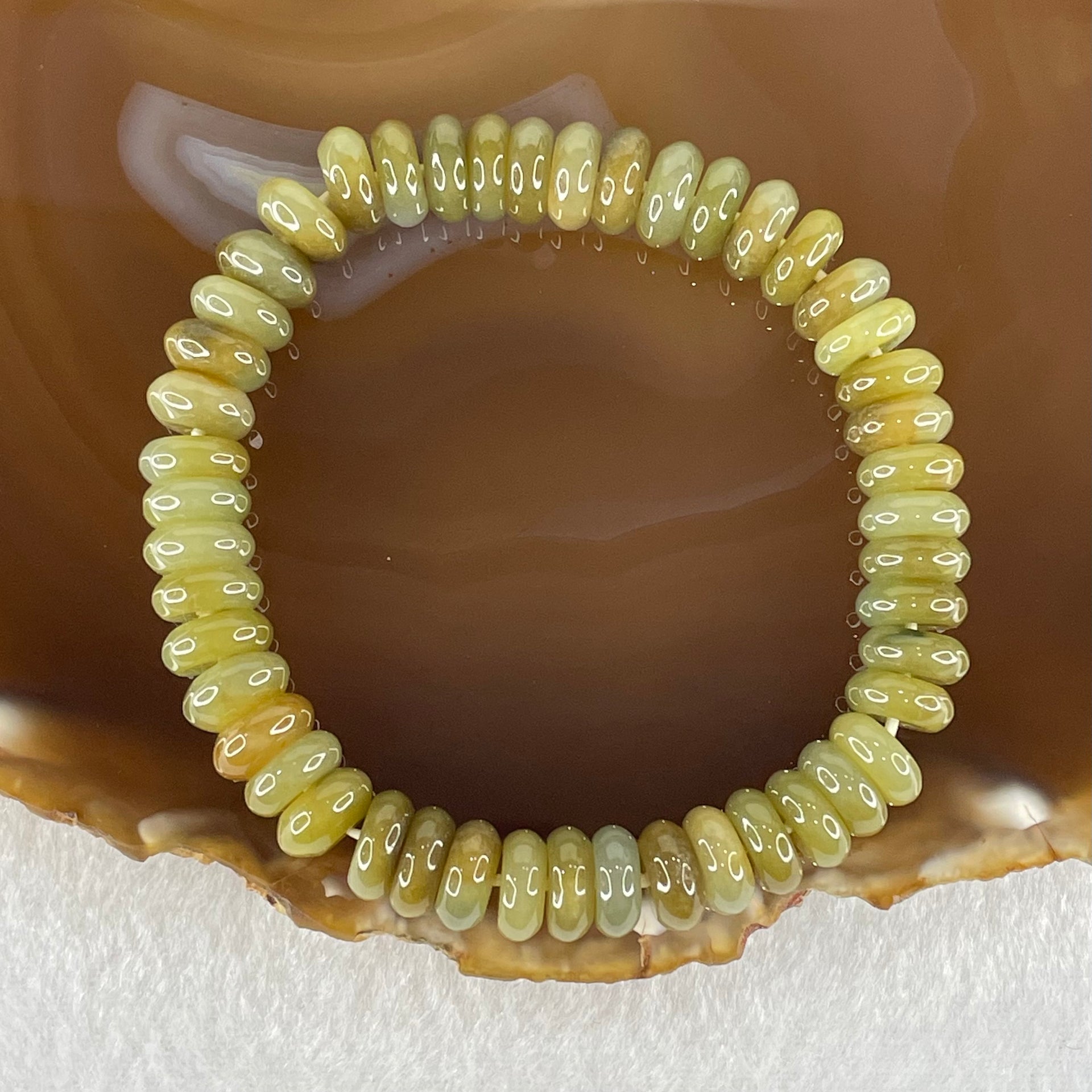 Type A Brown with Blueish Green Jadeite Ping An Kou Donut Beads Bracelet 33.05g 16cm 9.3mm 47pcs - Huangs Jadeite and Jewelry Pte Ltd
