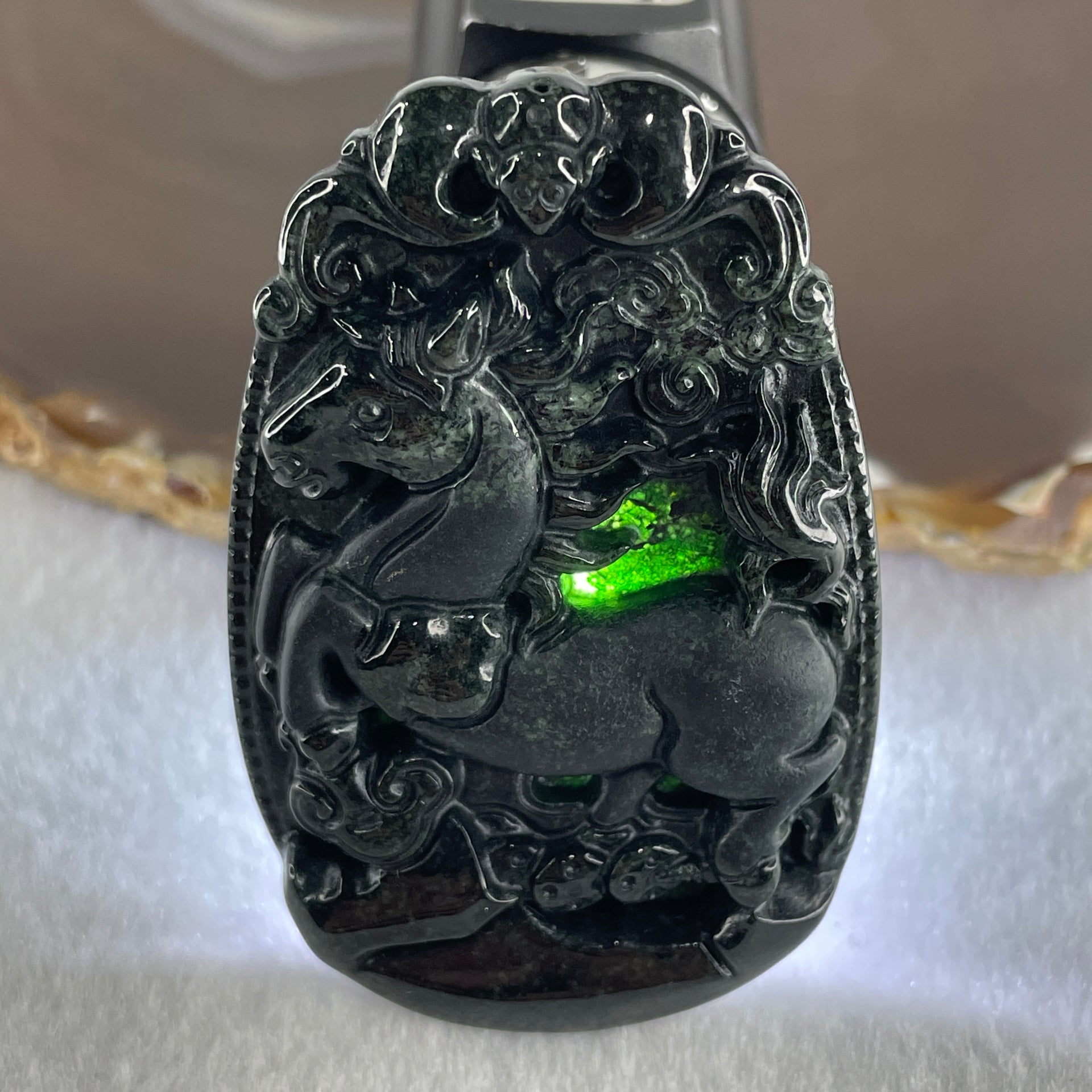 Type A Opaque to Partial Translucent Black Omphacite Jadeite Horse Pendant 26.34g 60.1 by 40.3 by 8.0mm - Huangs Jadeite and Jewelry Pte Ltd
