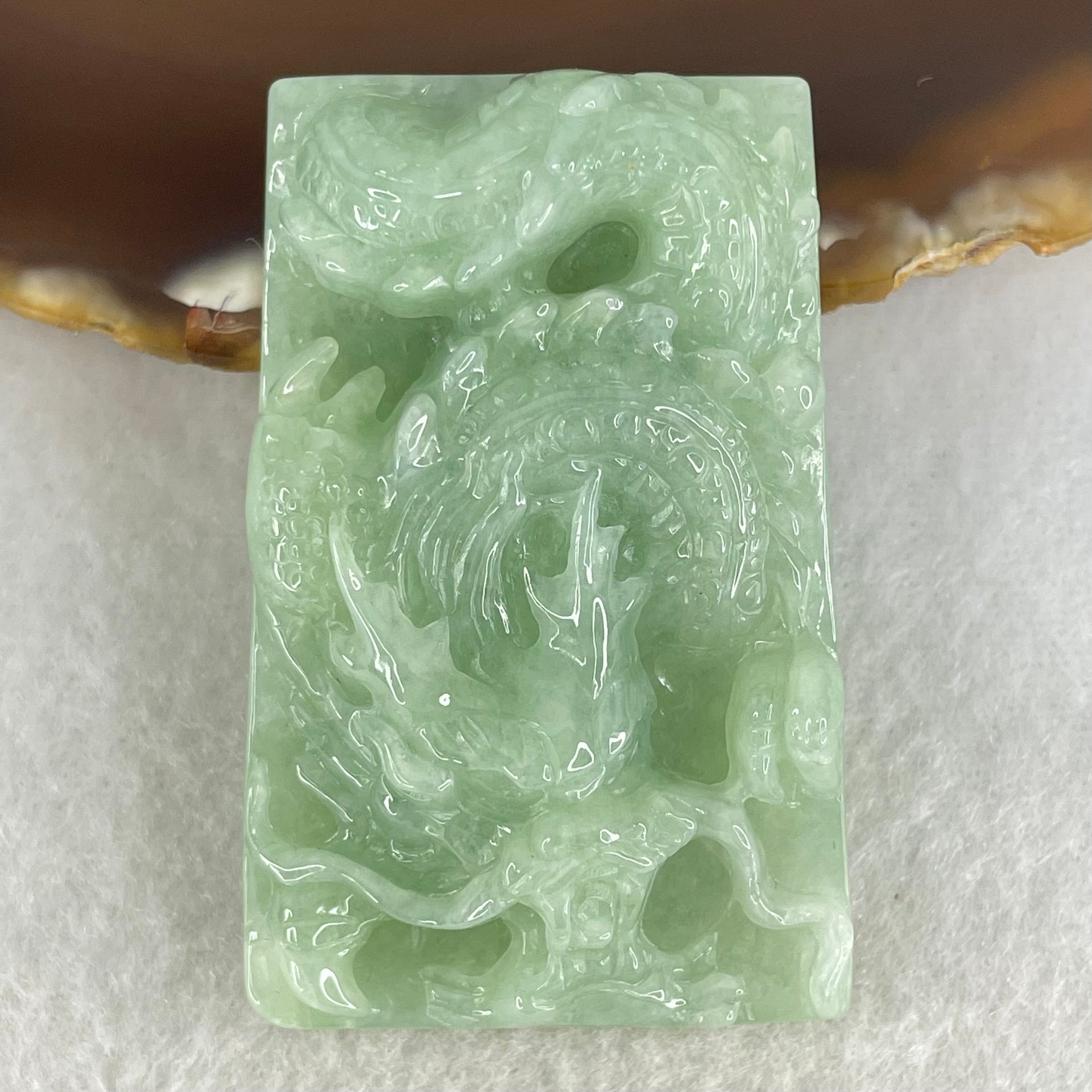 Type A Light Green Jadeite Dragon Pendant 43.35g 50.7 by 32.4 by 13.8mm - Huangs Jadeite and Jewelry Pte Ltd