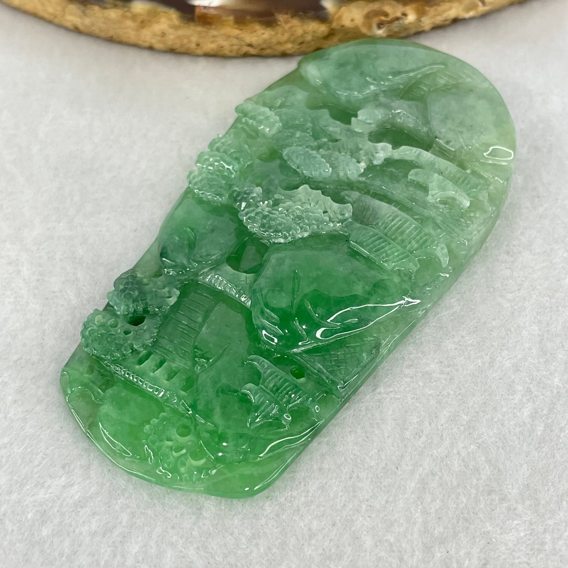 Type A Semi Icy Bright Green Jadeite Double Sided Shan Shui with Gui Ren Benefactor Pendant 47.64g 76.5 by 39.9 by 9.0mm - Huangs Jadeite and Jewelry Pte Ltd