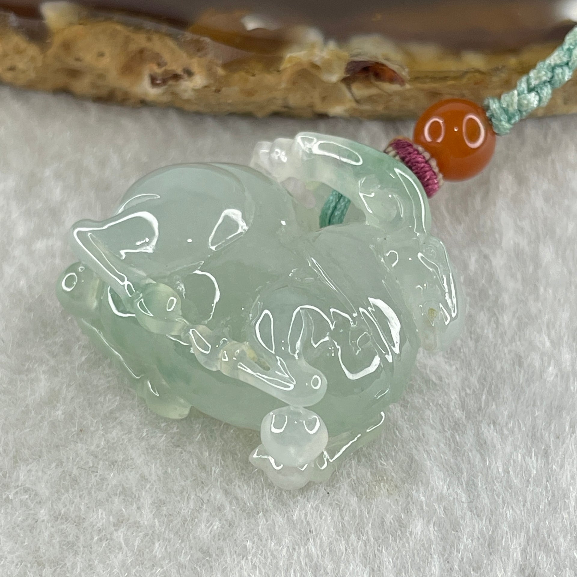 Type A Semi Icy Light Green with Green Spots Deer Pendant 21.16g 22.9 by 26.7 by 14.0mm - Huangs Jadeite and Jewelry Pte Ltd