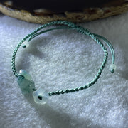Natural Type A Semi Icy Green with Dark Green Patches Jadeite Fish with Flower on String Bracelet 1.59g 15-18cm 15.6 by 7.9 by 3.5mm - Huangs Jadeite and Jewelry Pte Ltd