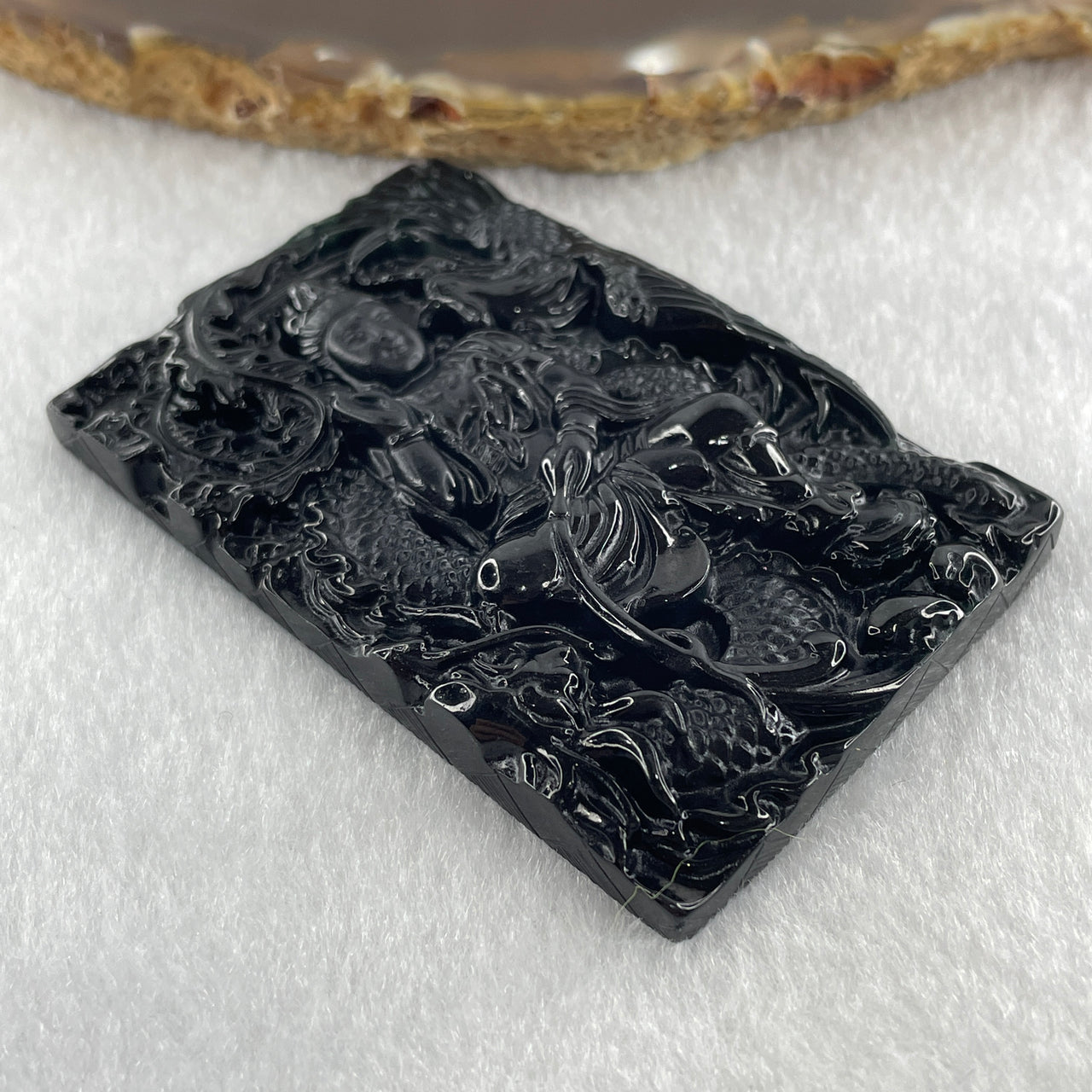 Type A Opaque to Partial Translucent Black Omphacite Jadeite Guan Yin with Dragon and Phoenix Pendant 34.30g 63.1 by 41.4 by 8.0mm - Huangs Jadeite and Jewelry Pte Ltd