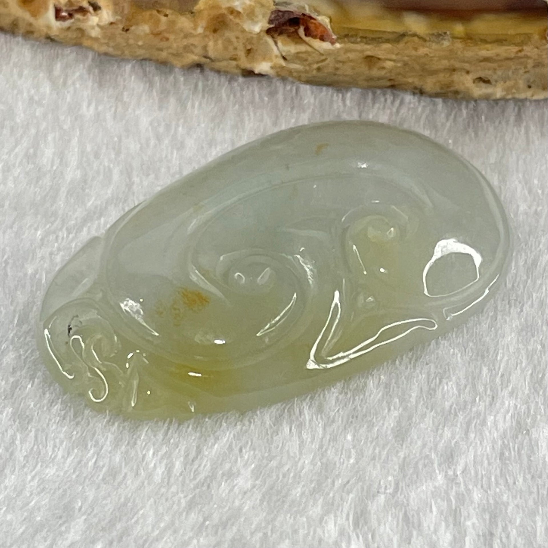 Type A Faint Lavender Green with Yellow Spots Jadeite Ruyi Pendant 6.92g 35.3 by 22.0 by 5.3mm - Huangs Jadeite and Jewelry Pte Ltd