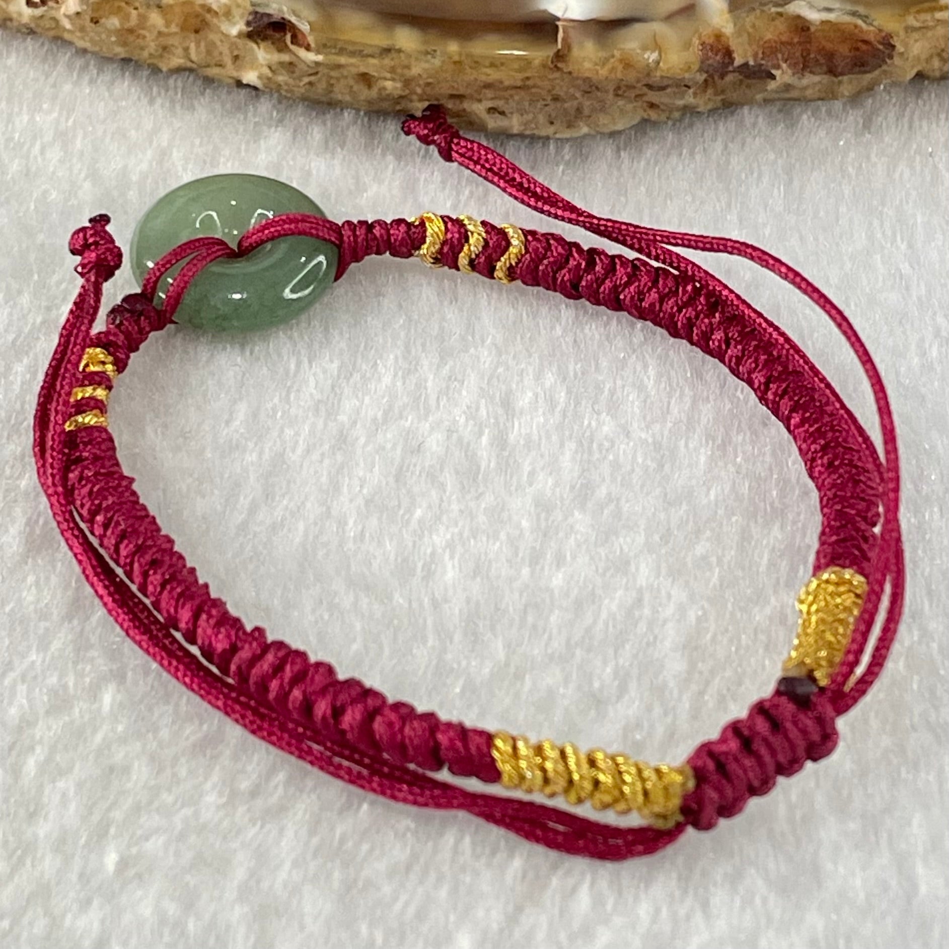 Type A Blueish Green Jadeite Ping An Kou Donut In String Bracelet 1.90g 12.5 by 3.8mm - Huangs Jadeite and Jewelry Pte Ltd