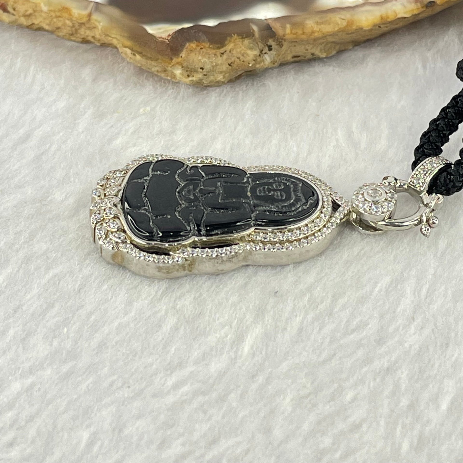 Type A Translucent Black Omphasite Jadeite Guan Yin 24.8 by 15.3 by 1.8mm Pendant in S925 Sliver Pendant 11.89g - Huangs Jadeite and Jewelry Pte Ltd