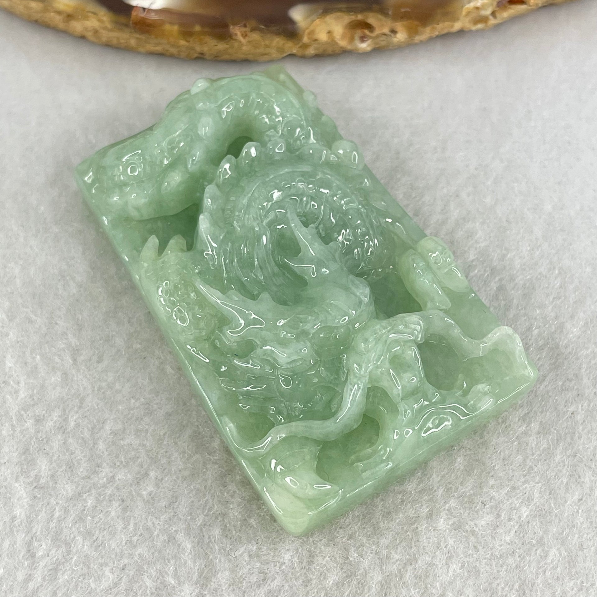Type A Light Green Jadeite Dragon Pendant 43.35g 50.7 by 32.4 by 13.8mm - Huangs Jadeite and Jewelry Pte Ltd
