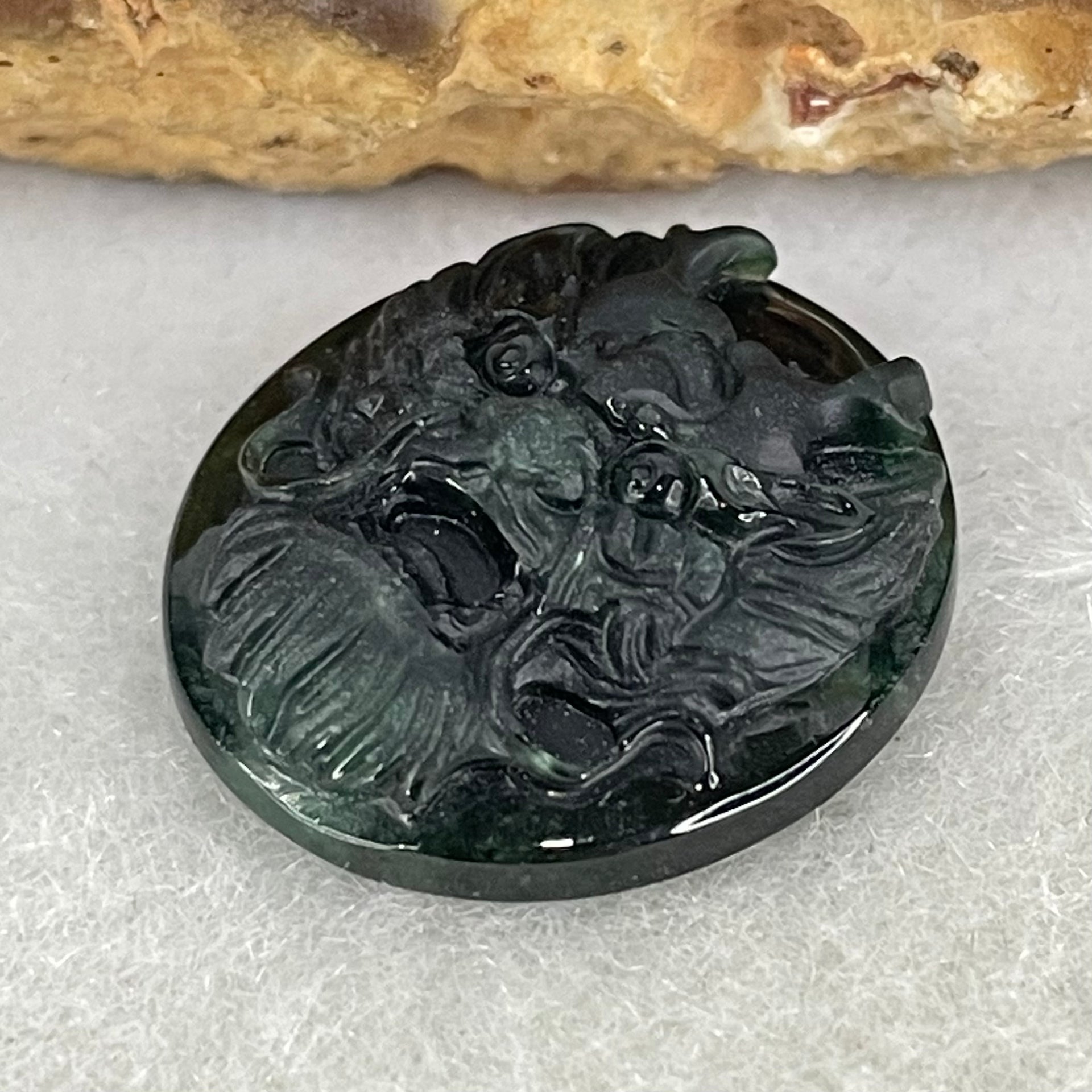 Rare Good Grade Type A Fully Translucent Black Jadeite Dragon Head Stone For Setting 
2.90g 18.2 by 16.8 by 6.3mm - Huangs Jadeite and Jewelry Pte Ltd
