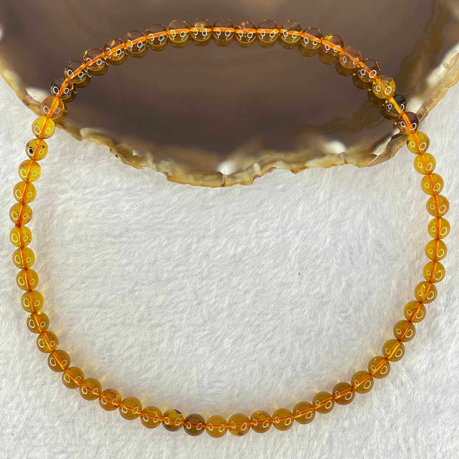Natural Gold Yellow Amber Elastic Necklace 天然黄琥珀项链 9.24g 32cm 6.7mm 59 Beads - Huangs Jadeite and Jewelry Pte Ltd