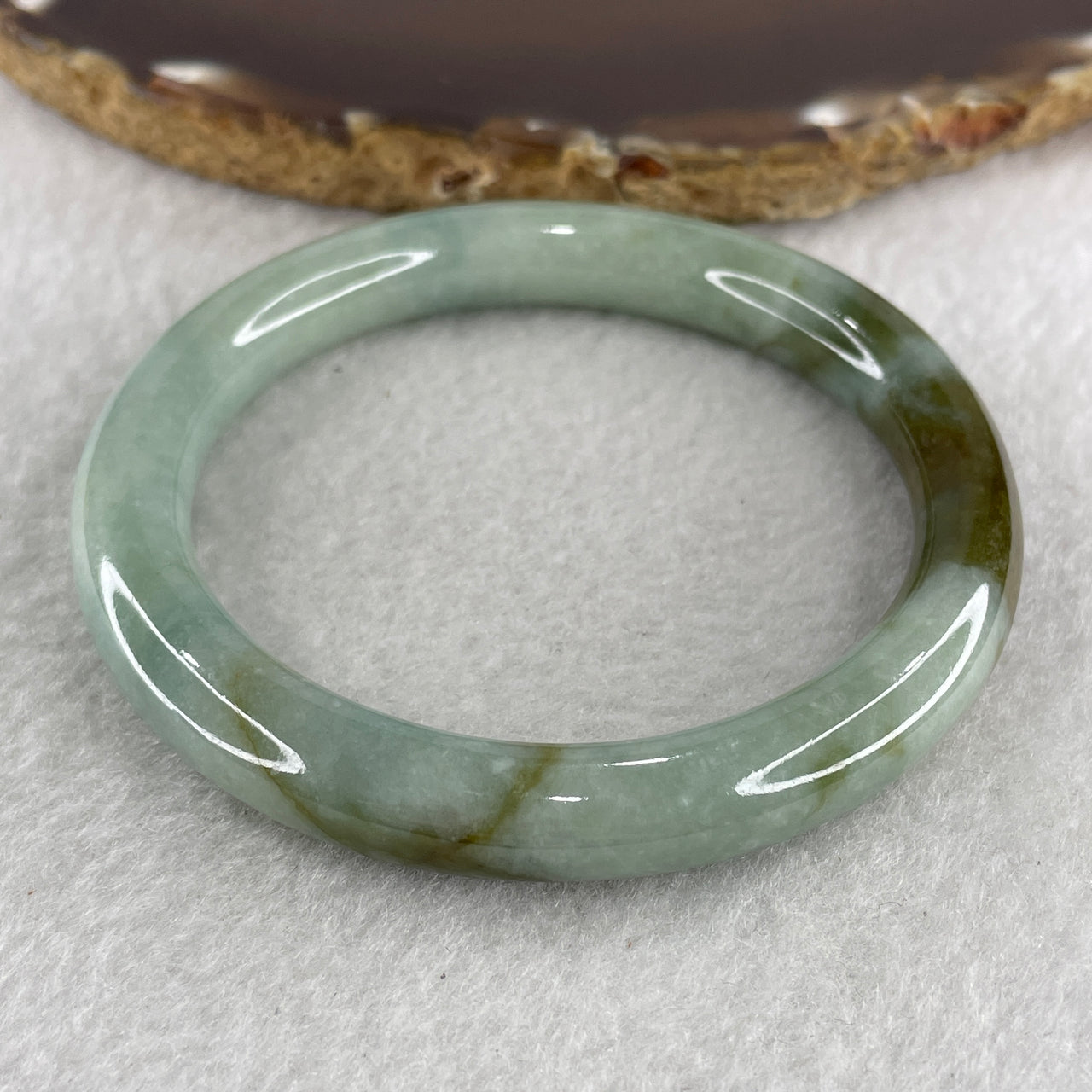 Type A Blueish Green with Brown Patches Jadeite Bangle 41.09g 9.3 by 8.7 mm Internal Diameter 55.0mm (Internal Lines) - Huangs Jadeite and Jewelry Pte Ltd