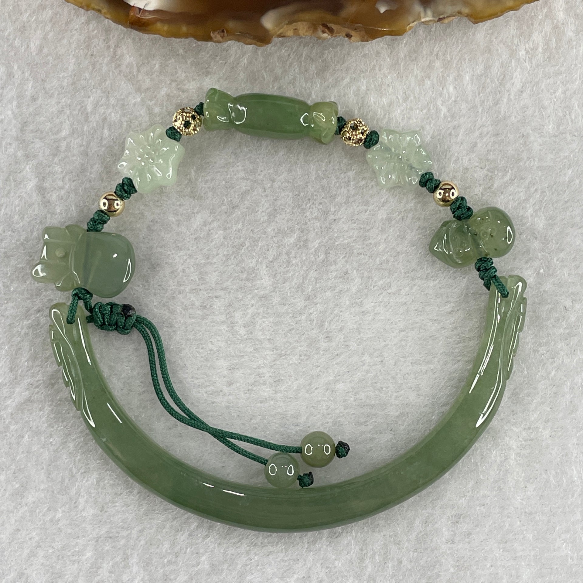 Natural Type A Semi Icy Full Green Jadeite Double Dragon Head with Candy and Snow Man Charm Bracelet 15.89g 16cm 6.2 by 6.4mm - Huangs Jadeite and Jewelry Pte Ltd