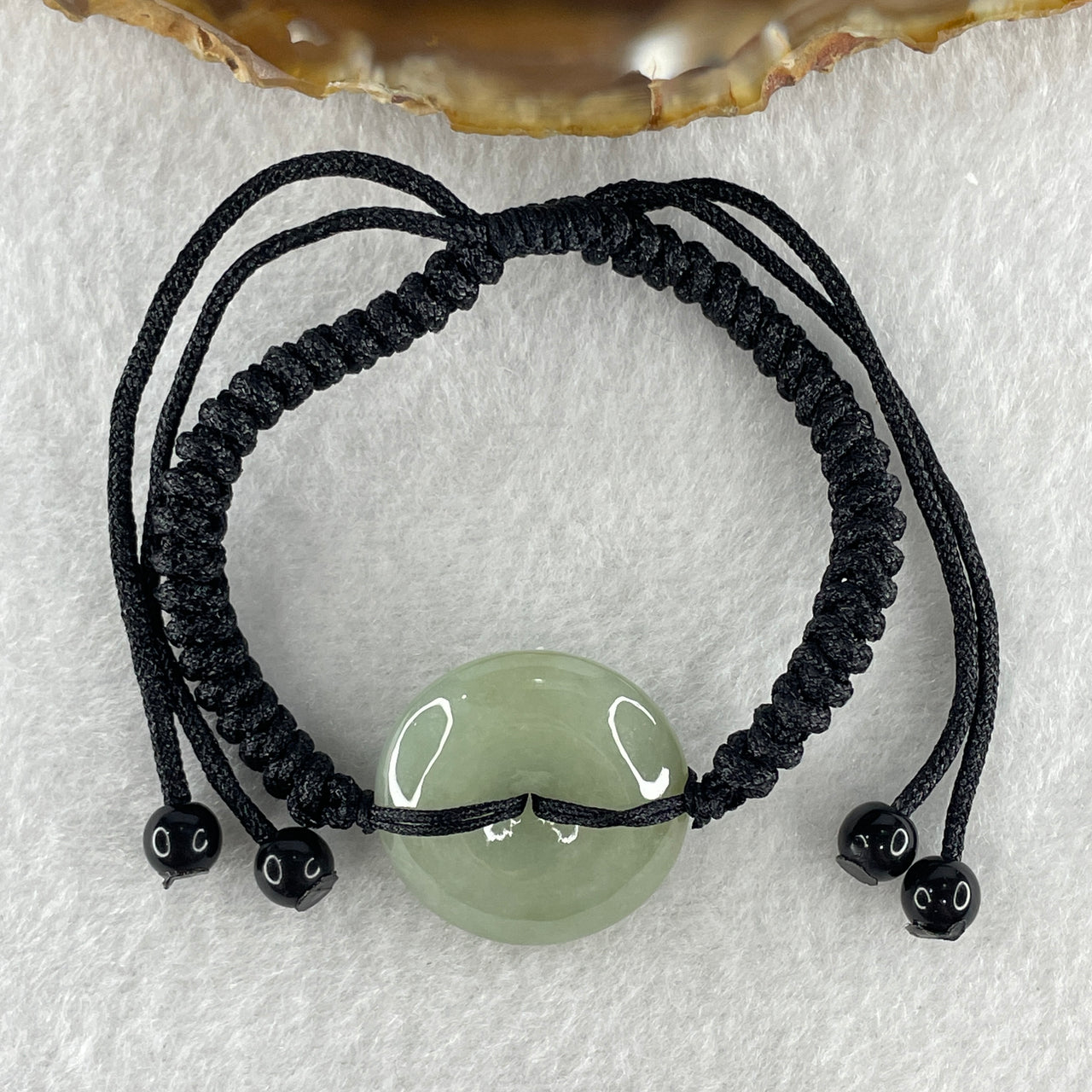 Natural Type A Green Jadeite Ping An Kou Donut String Bracelet 9.49g 23.3 by 6.7mm
