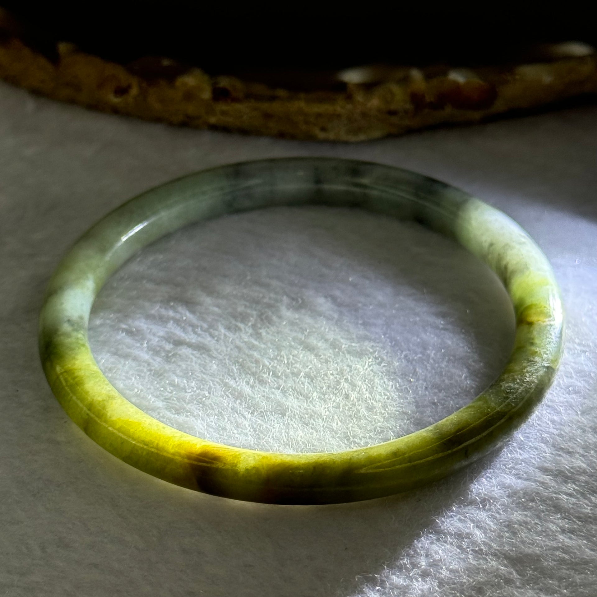 Type A Brownish Green with Green Piao Hua Jadeite Bangle 19.16g Internal Diameter 53.5mm 6.5 by 6.7mm (Slight External Line) - Huangs Jadeite and Jewelry Pte Ltd