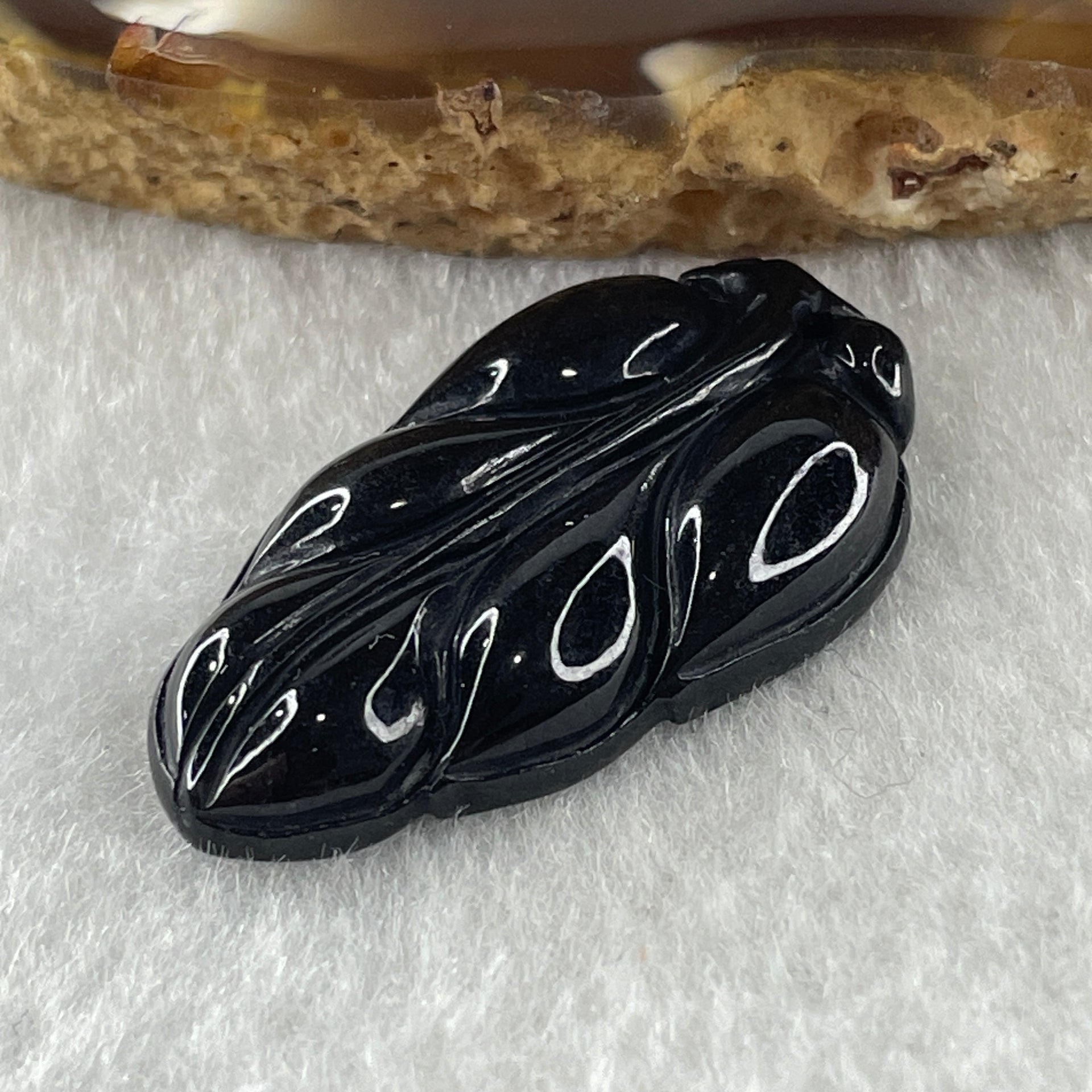 Type A Opaque Black Omphacite Leaf Pendant Charm 5.60g 31.5 by 18.0 by 5.7mm - Huangs Jadeite and Jewelry Pte Ltd