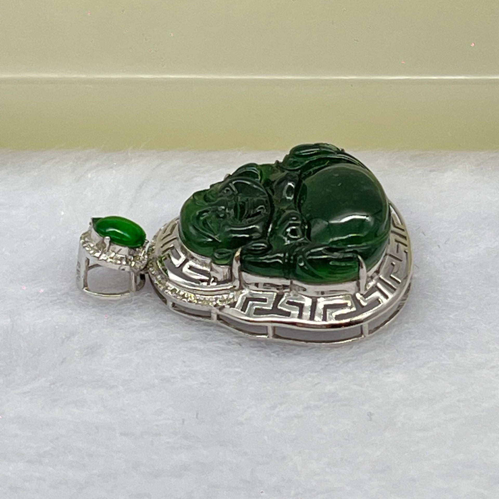 Type A Blueish Green Jadeite Milo Buddha Pendant Setting 18k White Gold 2.45g 25.6 by 19.4 by 7.2mm - Huangs Jadeite and Jewelry Pte Ltd