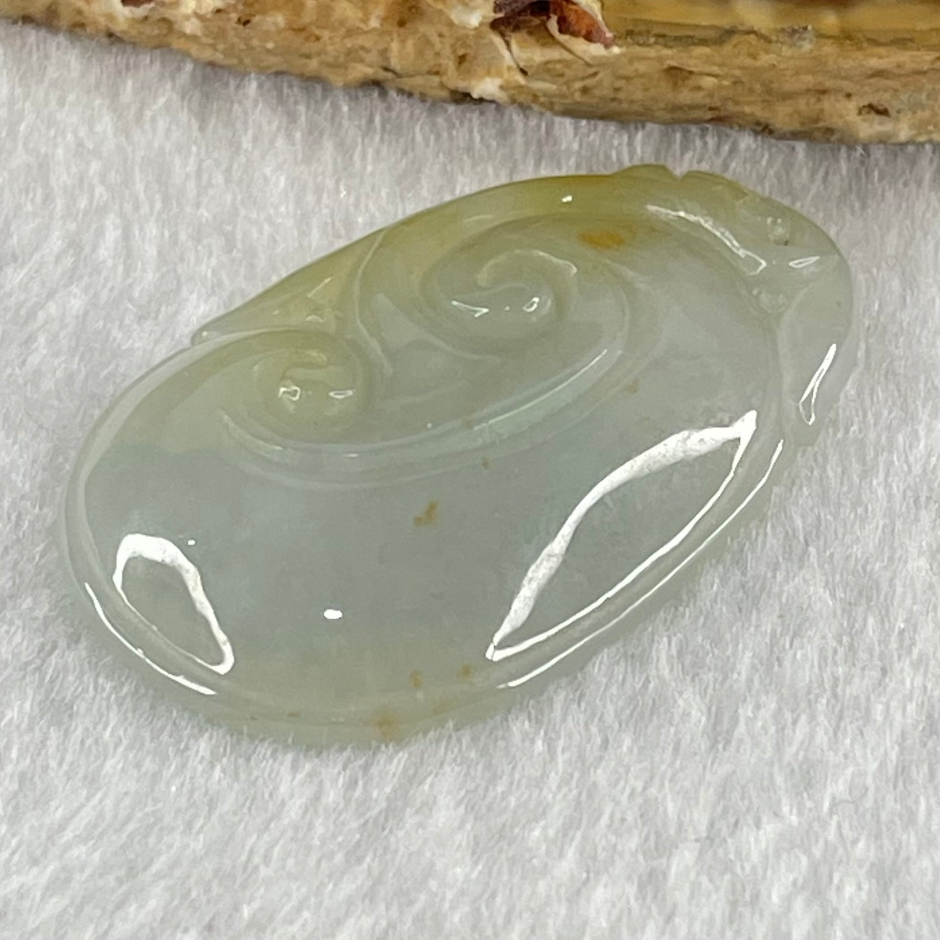 Type A Faint Lavender Green with Yellow Spots Jadeite Ruyi Pendant 6.92g 35.3 by 22.0 by 5.3mm - Huangs Jadeite and Jewelry Pte Ltd