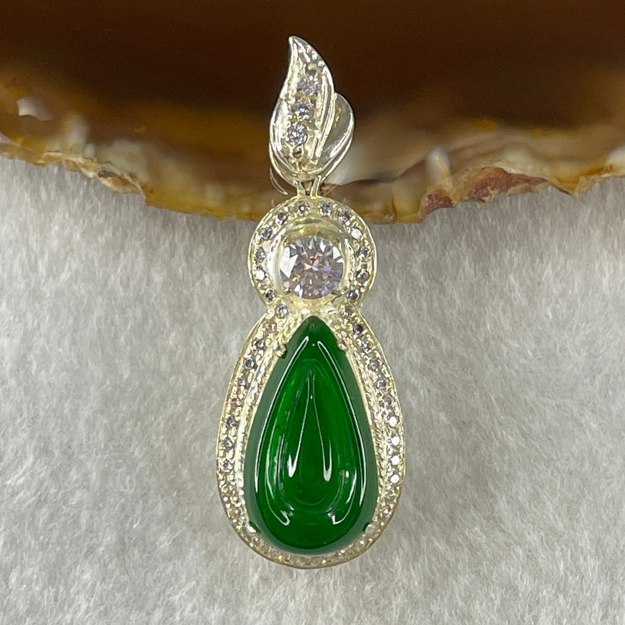 Type A Natural Semi Icy Bright Green Jadeite Tear Drop Shape Stone for Setting 18.1 by 10.5 by 3.0mm (On Silver Pendant Mold) 15.22g - Huangs Jadeite and Jewelry Pte Ltd