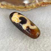 Aged Natural Powerful Tibetan Old Oily Blackish Brown Yellowish White Agate Green Tara Dzi Bead Heavenly Master (Tian Zhu) 绿度母天珠 4.86g 28.5 by 10.8mm - Huangs Jadeite and Jewelry Pte Ltd