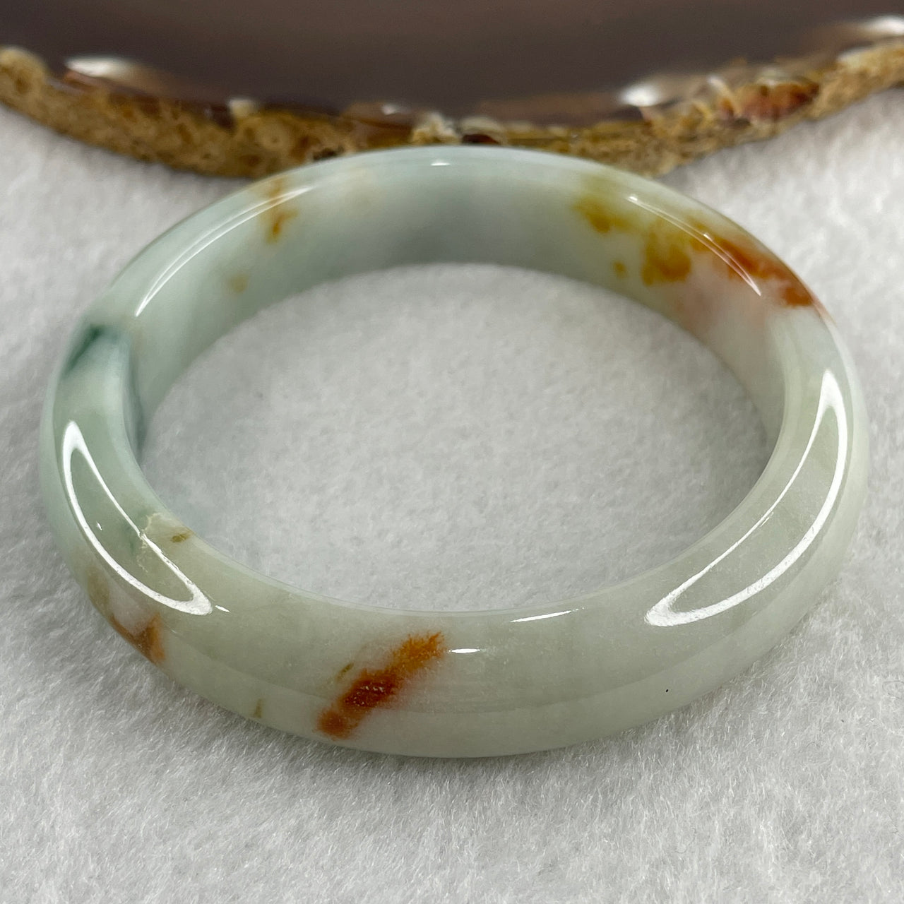 Type A Natural Light Green with Spicy Green and Brownish Patches Jadeite Bangle 55.09g Inner Diameter 57.5mm 12.7 by 9.0mm (Slight External Rough) - Huangs Jadeite and Jewelry Pte Ltd