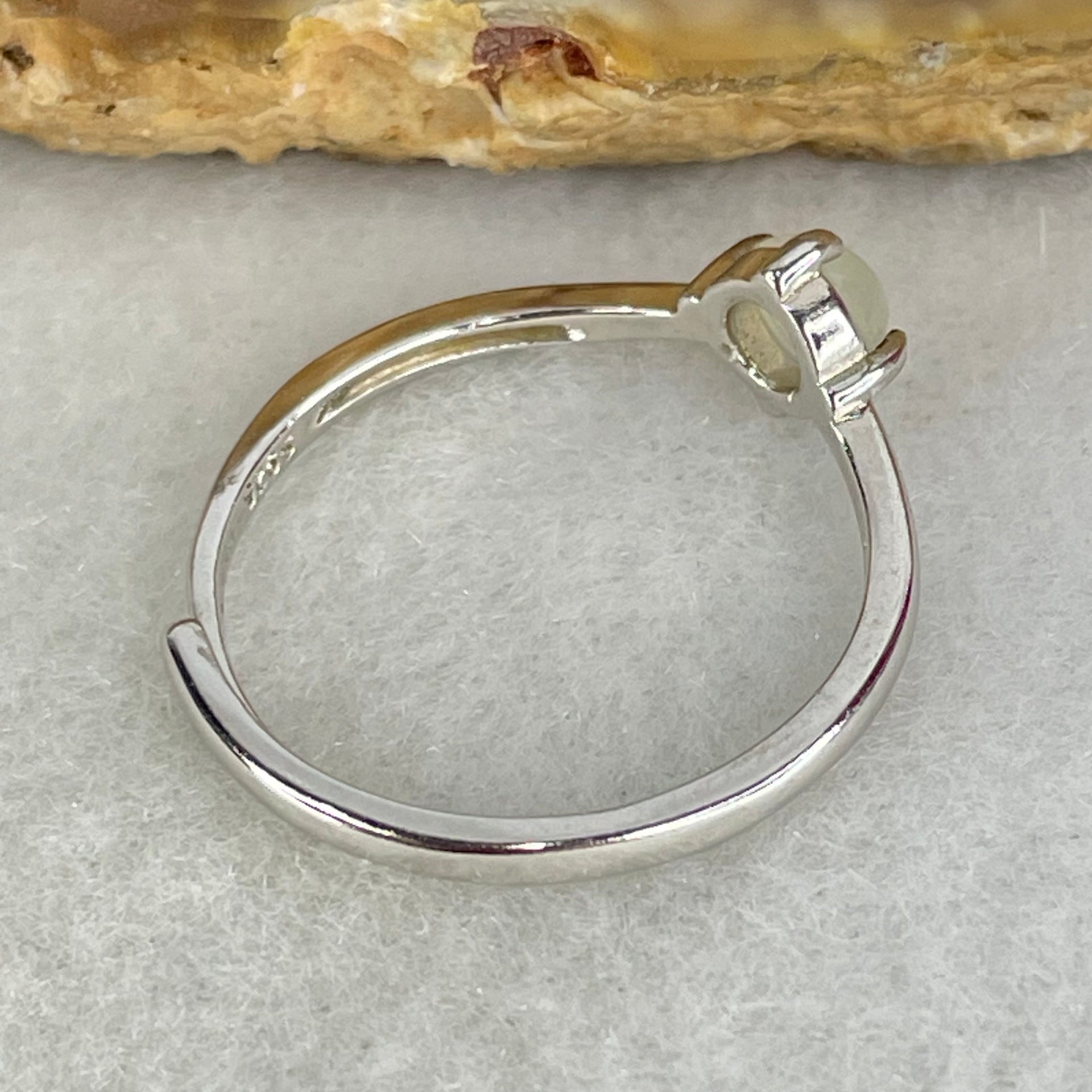 Type A Icy Faint Green Cabochon Jadeite in S925 Sliver Ring (Adjustable Size) 1.05g 4.5 by 3.0mm - Huangs Jadeite and Jewelry Pte Ltd