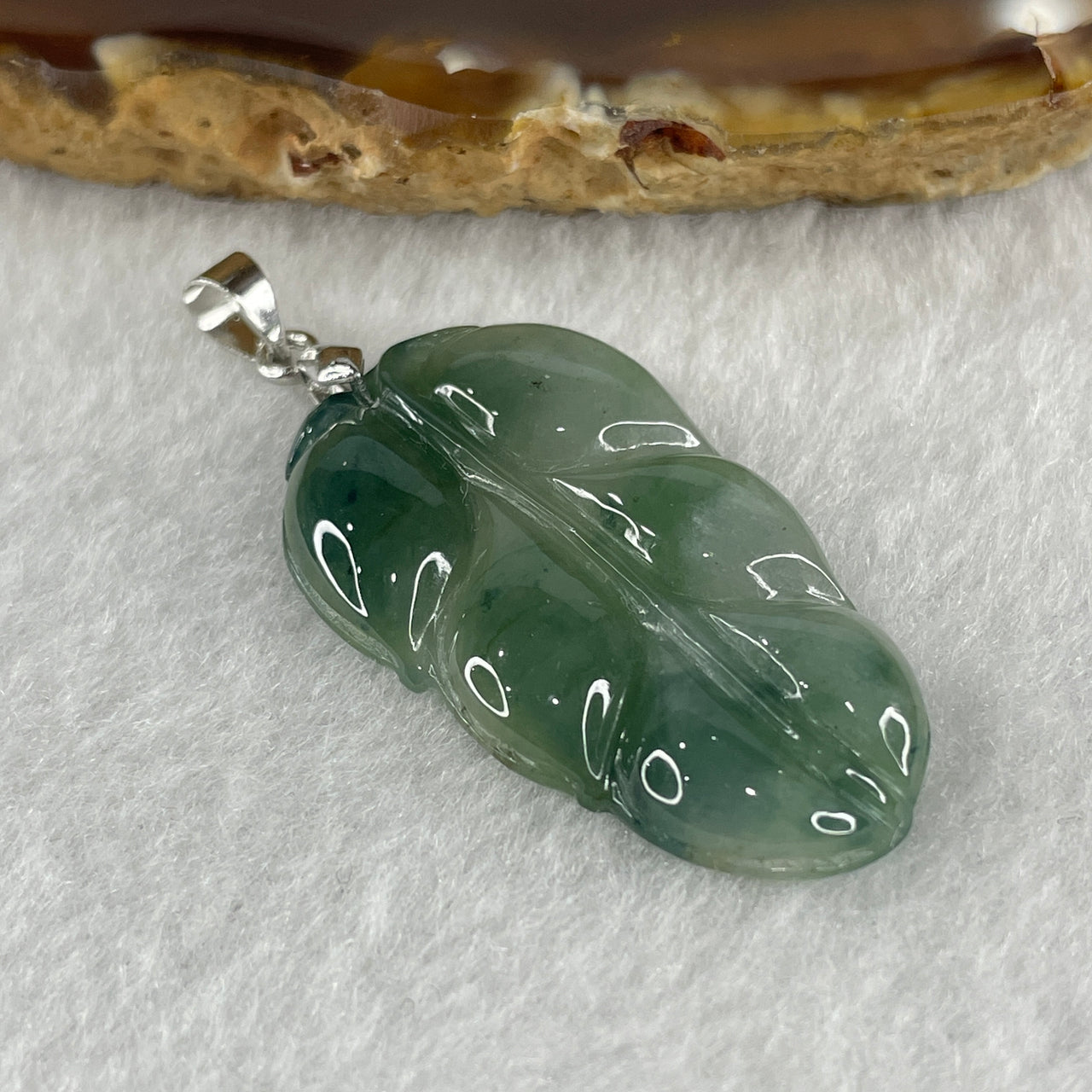 Natural Type A Semi Icy Green with Light Green Jadeite Prosperity Leaf Pendant in Silver Clasp Signifying Overnight Success 5.19g 33.7 by 19.4 by 4.6mm - Huangs Jadeite and Jewelry Pte Ltd