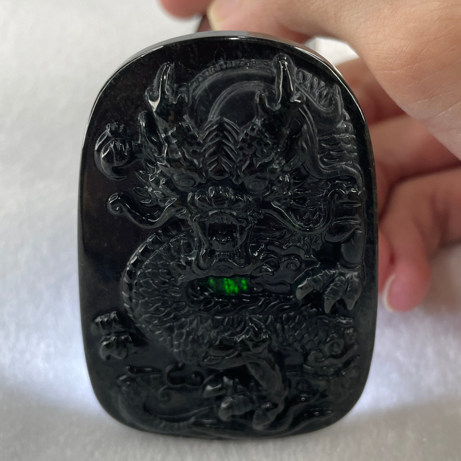 Type A Opaque to Partial Translucent Black Omphacite Jadeite Dragon Pendant 34.19g 66.8 by 45.5 by 9.4mm - Huangs Jadeite and Jewelry Pte Ltd