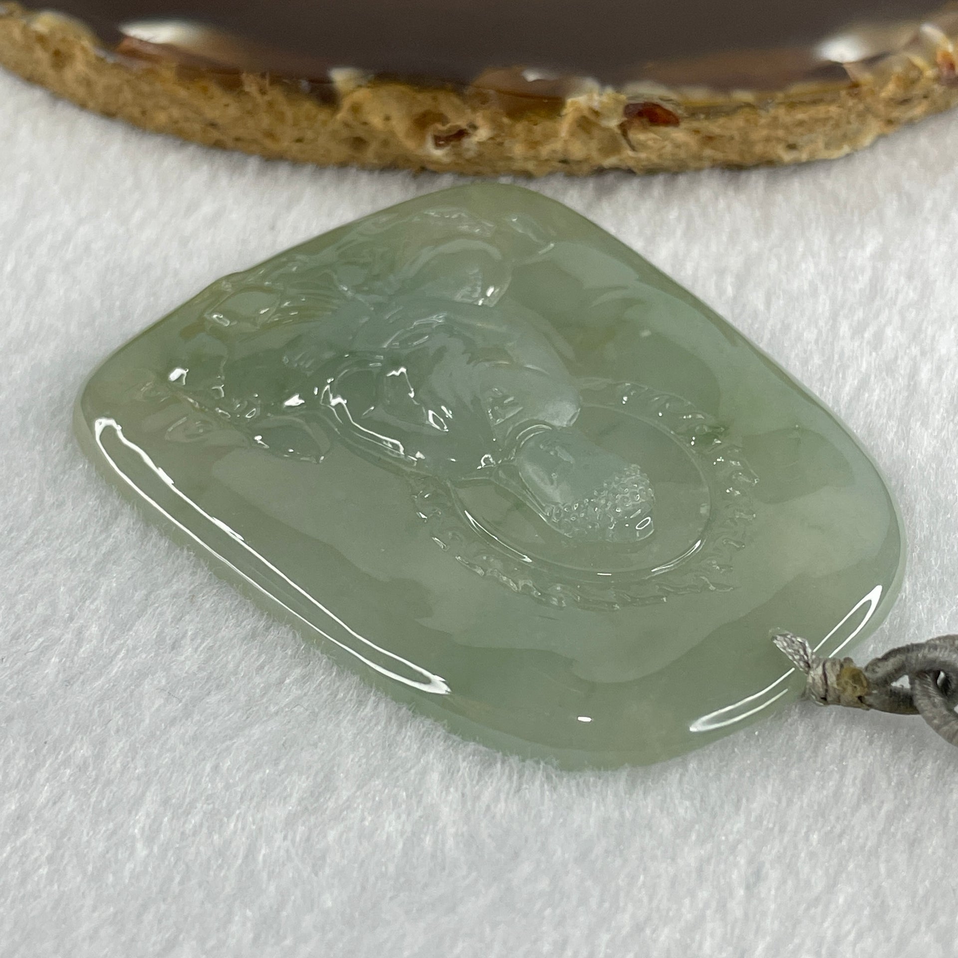 Type A Icy Light Green Jadeite Buddha Pendant 34.74g 61.3 by 48.3 by 5.5mm - Huangs Jadeite and Jewelry Pte Ltd