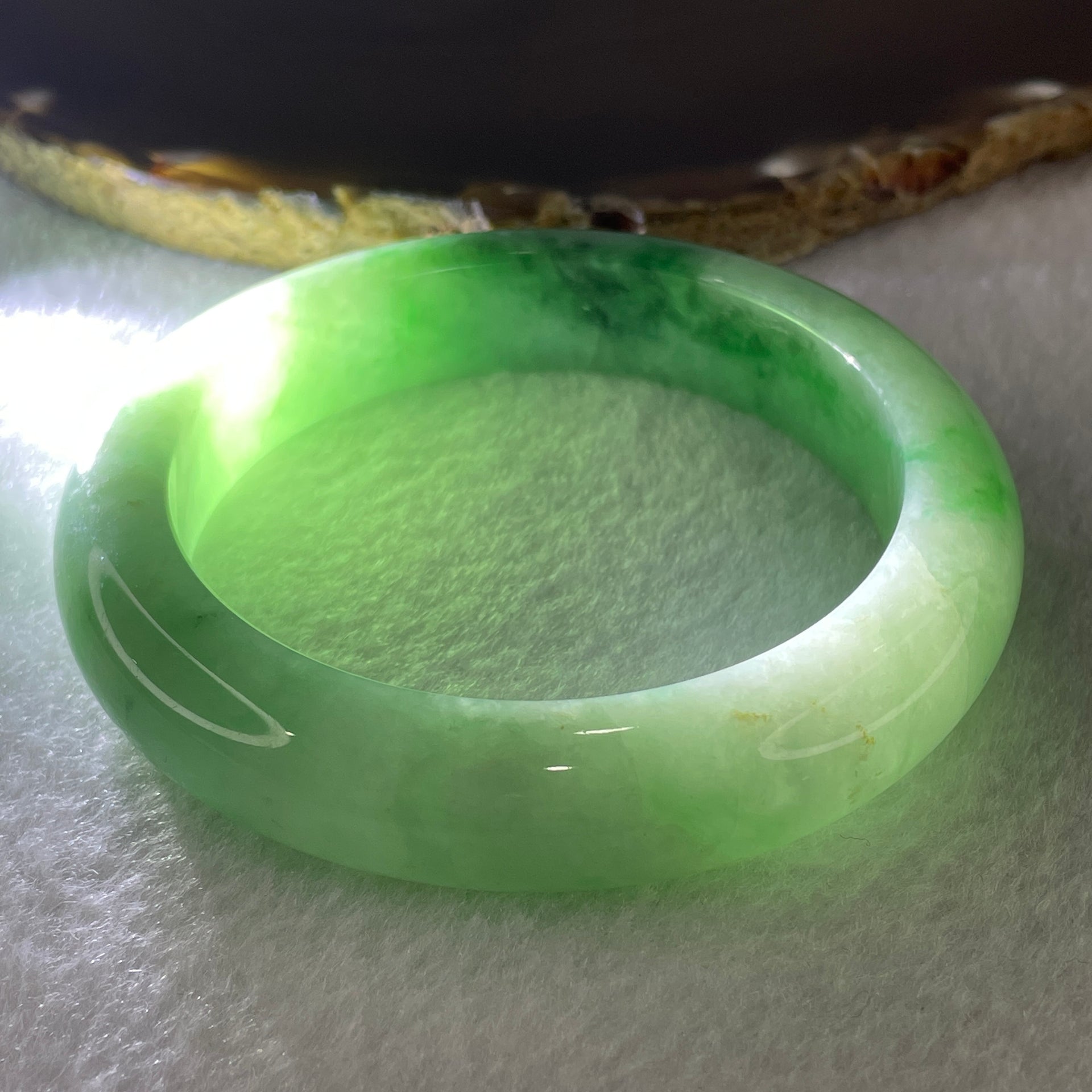 Certified Natural Type A Light Apple Green with Emerald Green Fluorite Piao Hua Jadeite Bangle 75.87g Internal Diameter 58.0mm 13.5 by 10.0mm ( Slight Internal Line) - Huangs Jadeite and Jewelry Pte Ltd