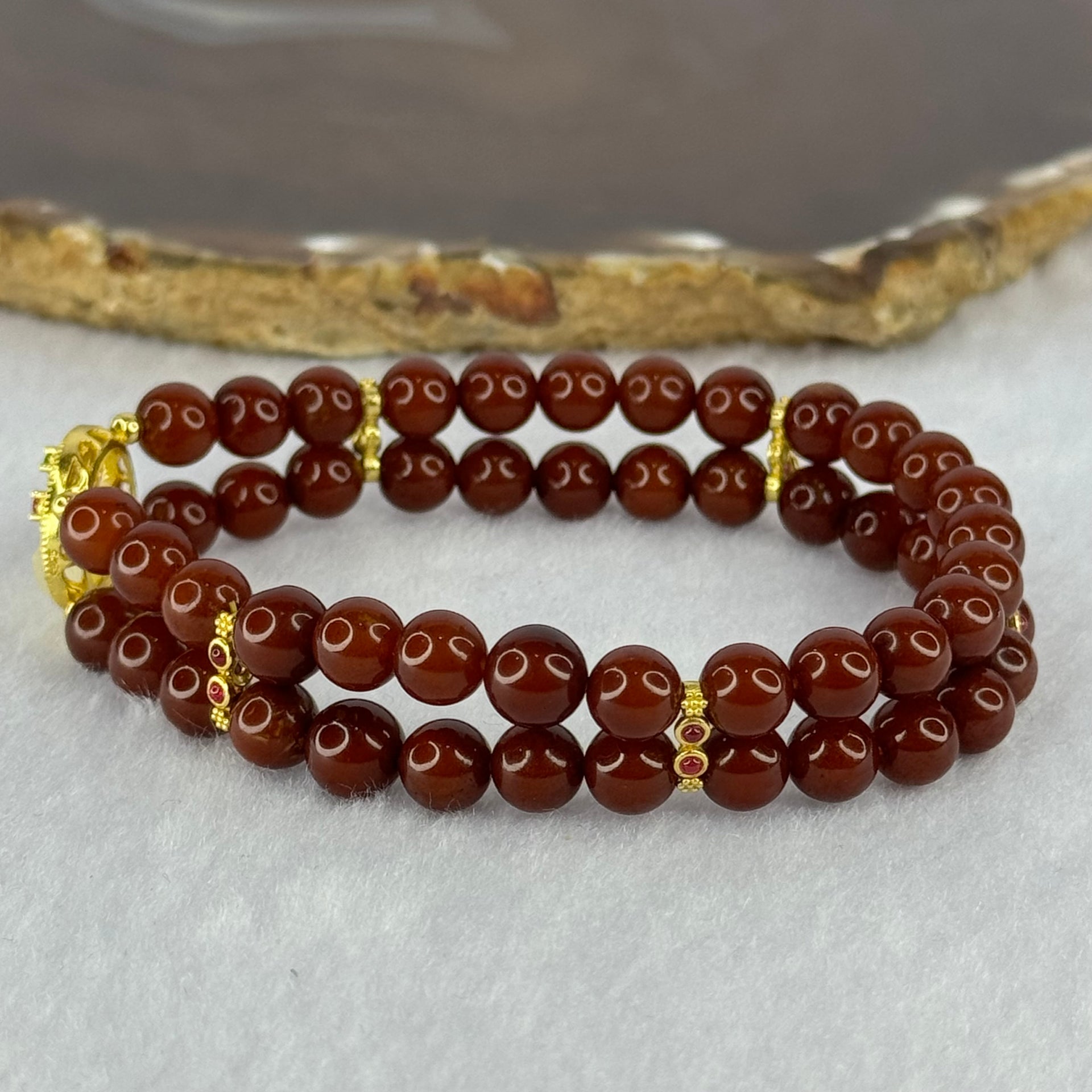 Natural Brownish Red Amber Beads with Gold Color Charms Bracelet 10.69g 16.5cm 6.5mm 52 Beads - Huangs Jadeite and Jewelry Pte Ltd
