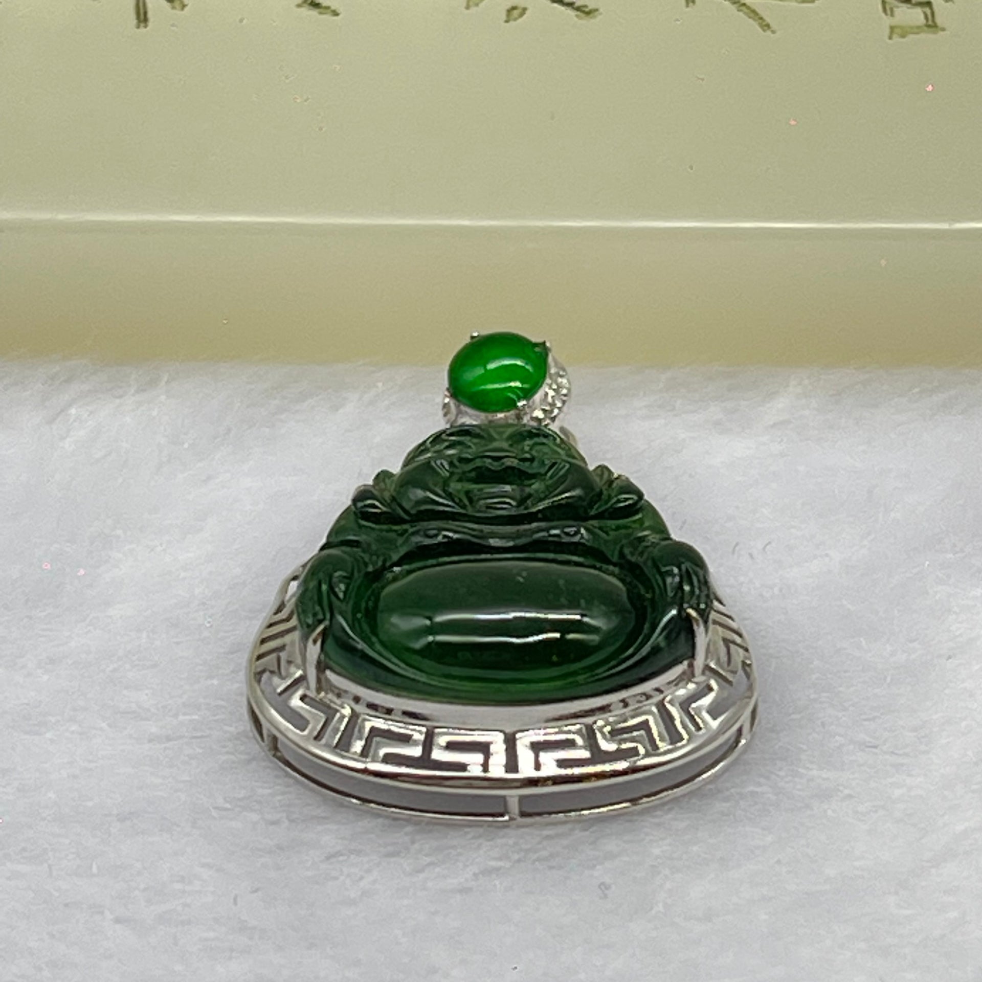 Type A Blueish Green Jadeite Milo Buddha Pendant Setting 18k White Gold 2.45g 25.6 by 19.4 by 7.2mm - Huangs Jadeite and Jewelry Pte Ltd