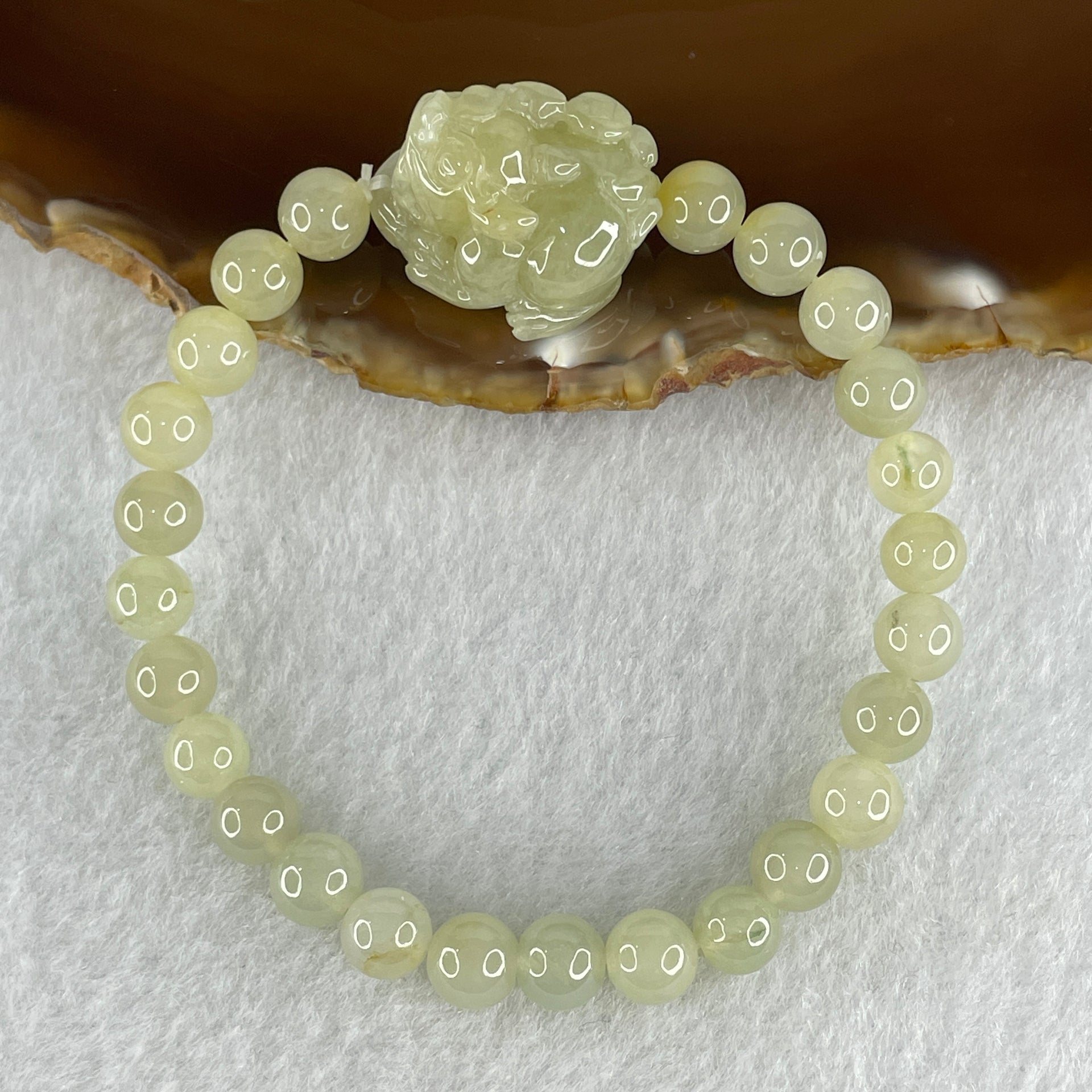 Special Edition Natural Type A Light Green with Yellow Jadeite Male Pixiu 20.9 by 17.7 by 13.0mm with Jadeite Beads Bracelet 22.18g 16cm 7.0mm 25 Beads - Huangs Jadeite and Jewelry Pte Ltd
