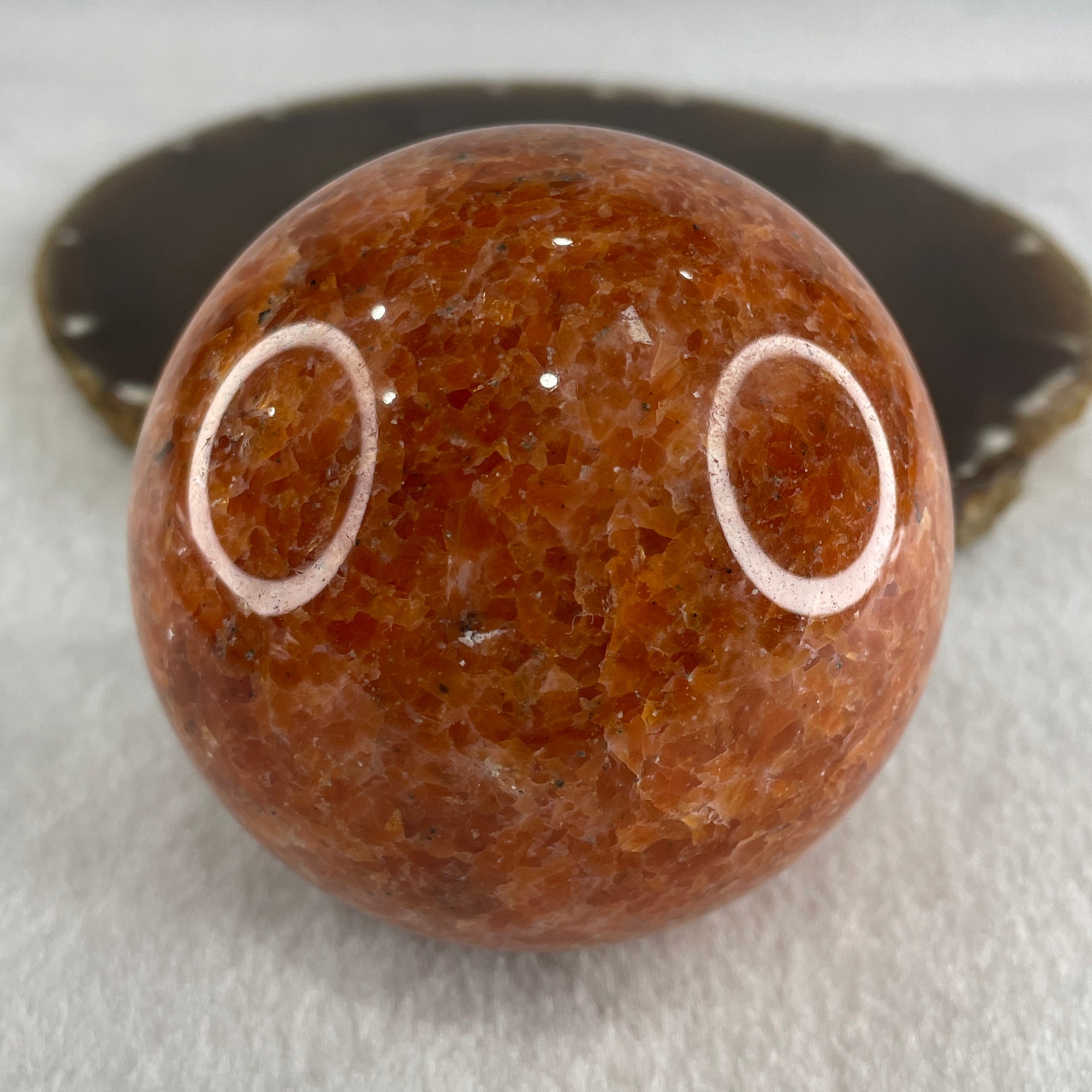 Natural Orange Calcite Ball with Clear Acrylic Display 545.43g 72.0 by 91.0mm - Huangs Jadeite and Jewelry Pte Ltd