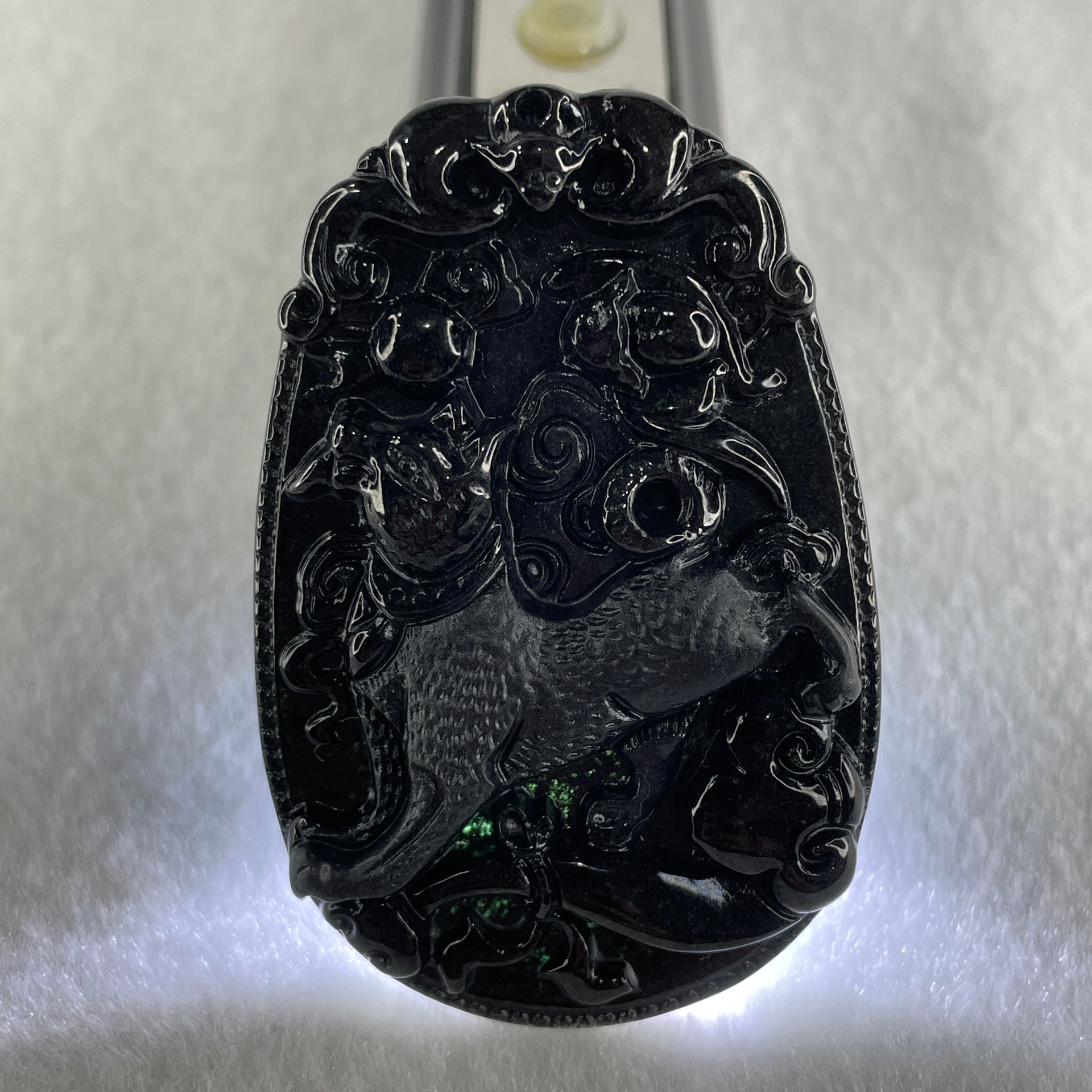 Type A Opaque to Partial Translucent Black Omphacite Jadeite Dog Pendant 23.89g 59.8 by 39.8 by 8.6mm - Huangs Jadeite and Jewelry Pte Ltd