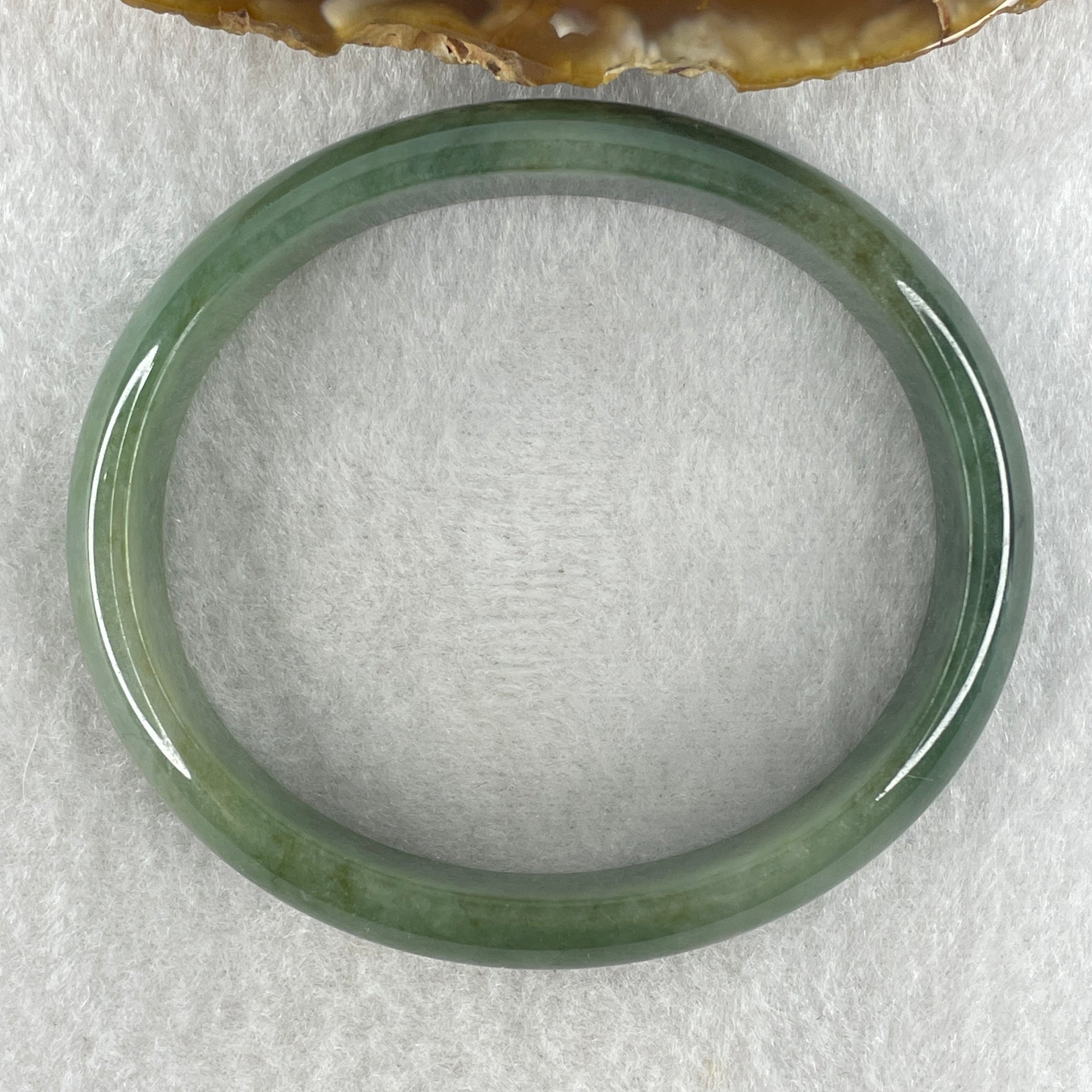 Type A Natural Oily Green Jadeite Oval Bangle 38.02g Inner Diameter 57.8mm 13.0 by 6.1mm (Very Slight Internal Lines) - Huangs Jadeite and Jewelry Pte Ltd