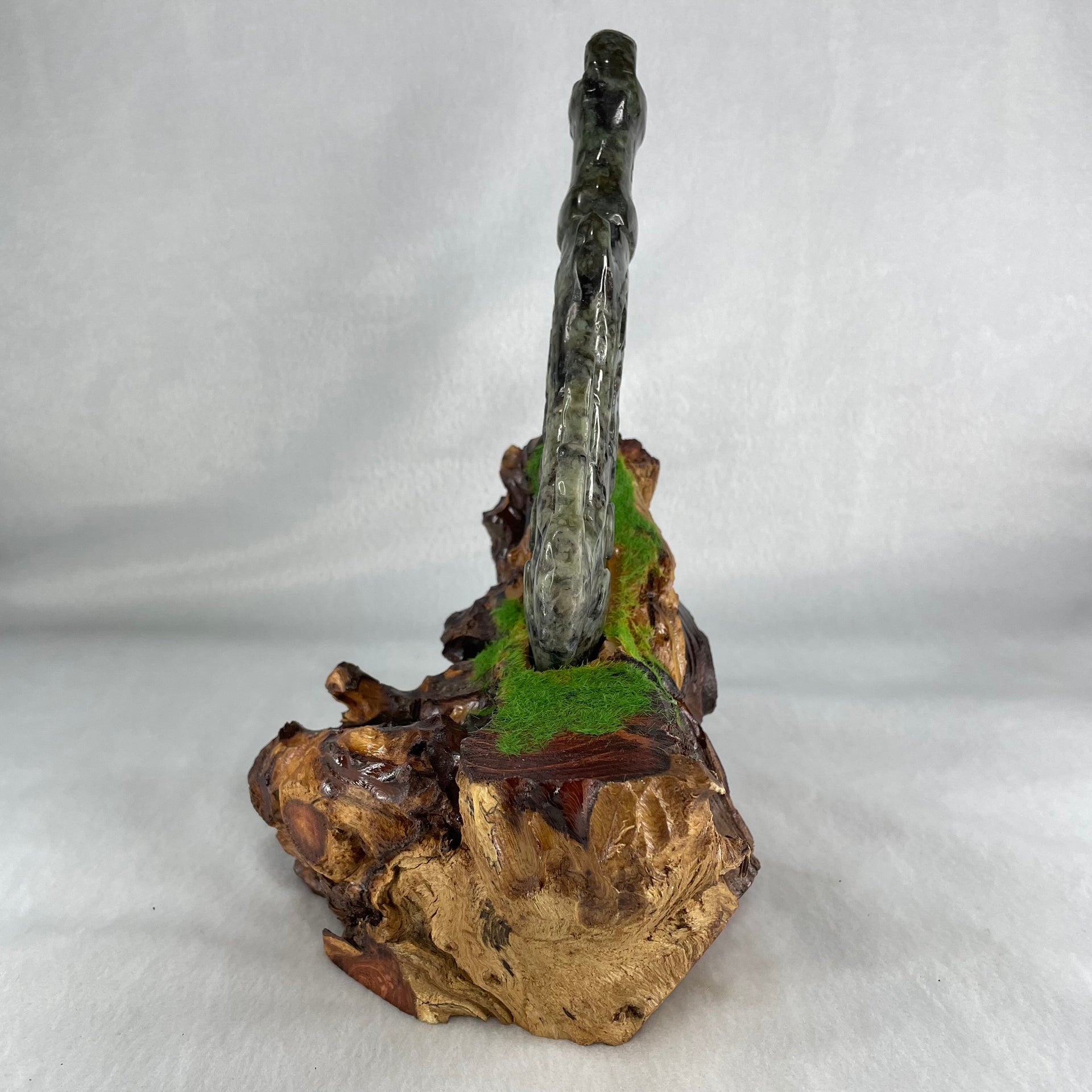 Type A Green with Dark Green to Black Piao Hu Flora Jadeite Axe with Yin and Yang 320.38g with Wooden Stand Display Total 904.5g 170.0 by 124.0 by 195.0mm - Huangs Jadeite and Jewelry Pte Ltd