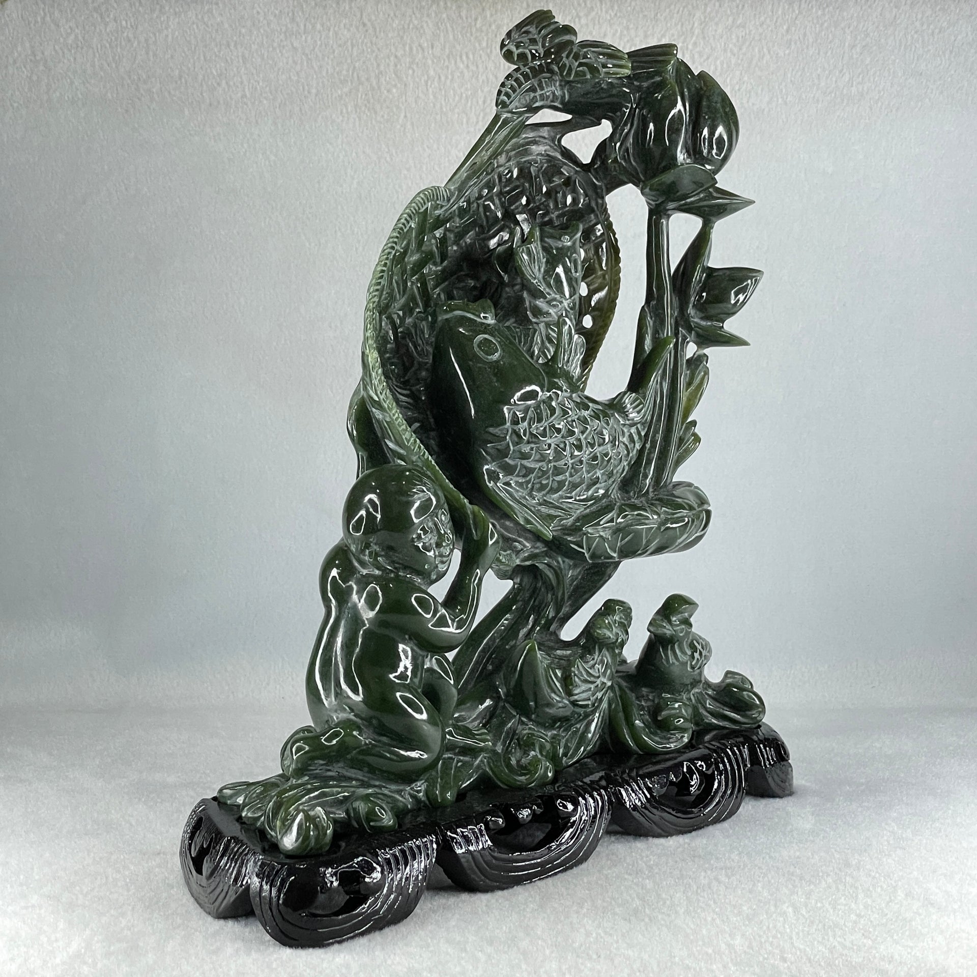 Natural Dark Green Serpentine Double Carp Fish with Gui ren and Lotus and Twin Ducks with Wooden Stand Display 2,032.7g 242.0 by 95.0 by 263.0mm - Huangs Jadeite and Jewelry Pte Ltd