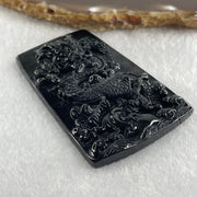 Type A Opaque to Partial Translucent Black Omphacite Jadeite Dragon Pendant 30.25g 64.4 by 42.8 by 8.2mm - Huangs Jadeite and Jewelry Pte Ltd