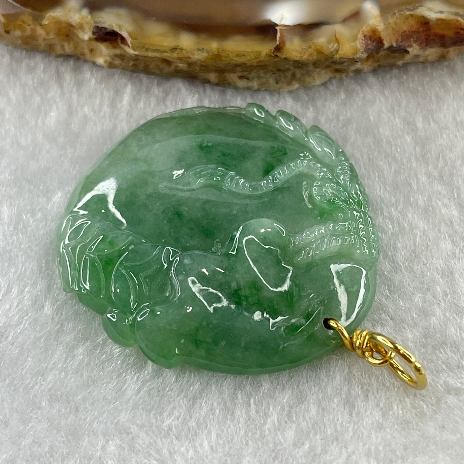 916 22K Yellow Gold Type A Natural Green with Emerald Green Spots Jadeite Money Bag with Coins Pendant 13.22g 33.1 by 32.6 by 6.7mm - Huangs Jadeite and Jewelry Pte Ltd