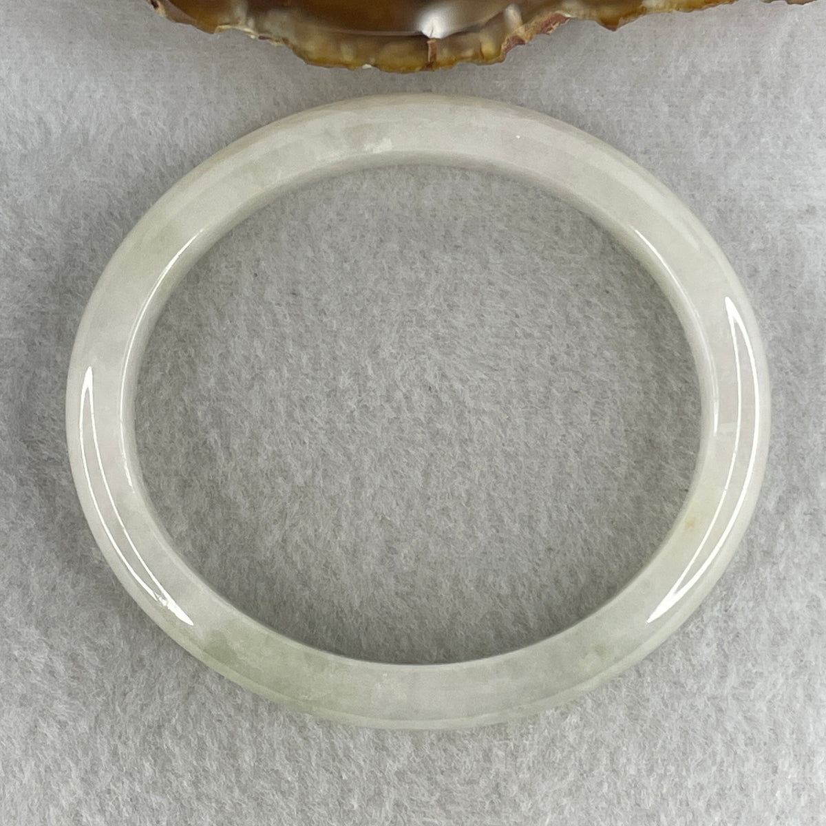 Certified Natural Type A Near White & Faint Green Jadeite Oval Bangle | 65.1mm Inner Diameter (48.42g 10.8x7.7mm | Internal Line, Slight External Rough | Pure Peace & Heart Harmony) - Huangs Jadeite and Jewelry Pte Ltd