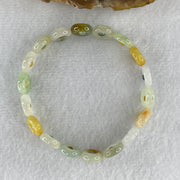 Natural Type A Muti Green with Lavender Yellowish Jadeite Donut Bracelet 12.17g 15.5cm 9.9 by 3.2mm 18 Ping An Kow - Huangs Jadeite and Jewelry Pte Ltd
