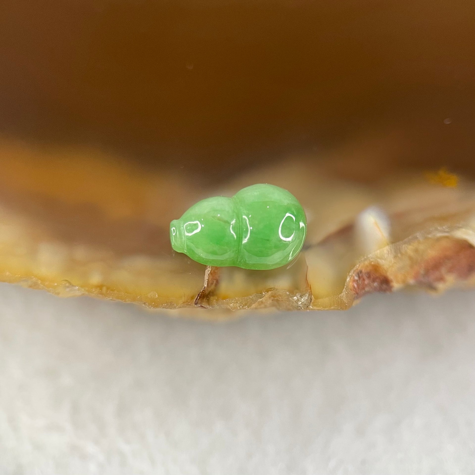 Type A Old Mine Spicy Green Jadeite Hulu Charm Stone For Setting 0.23g 8.0 by 5.5 by 2.8mm - Huangs Jadeite and Jewelry Pte Ltd