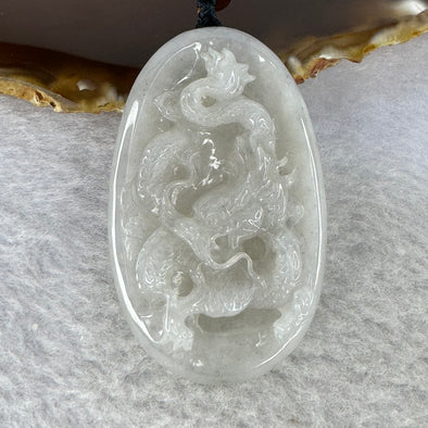 Type A Semi Icy Faint Greyish Lavender Jadeite Dragon Pendent 30.83g 57.0 by 34.8 by 8.4 mm - Huangs Jadeite and Jewelry Pte Ltd