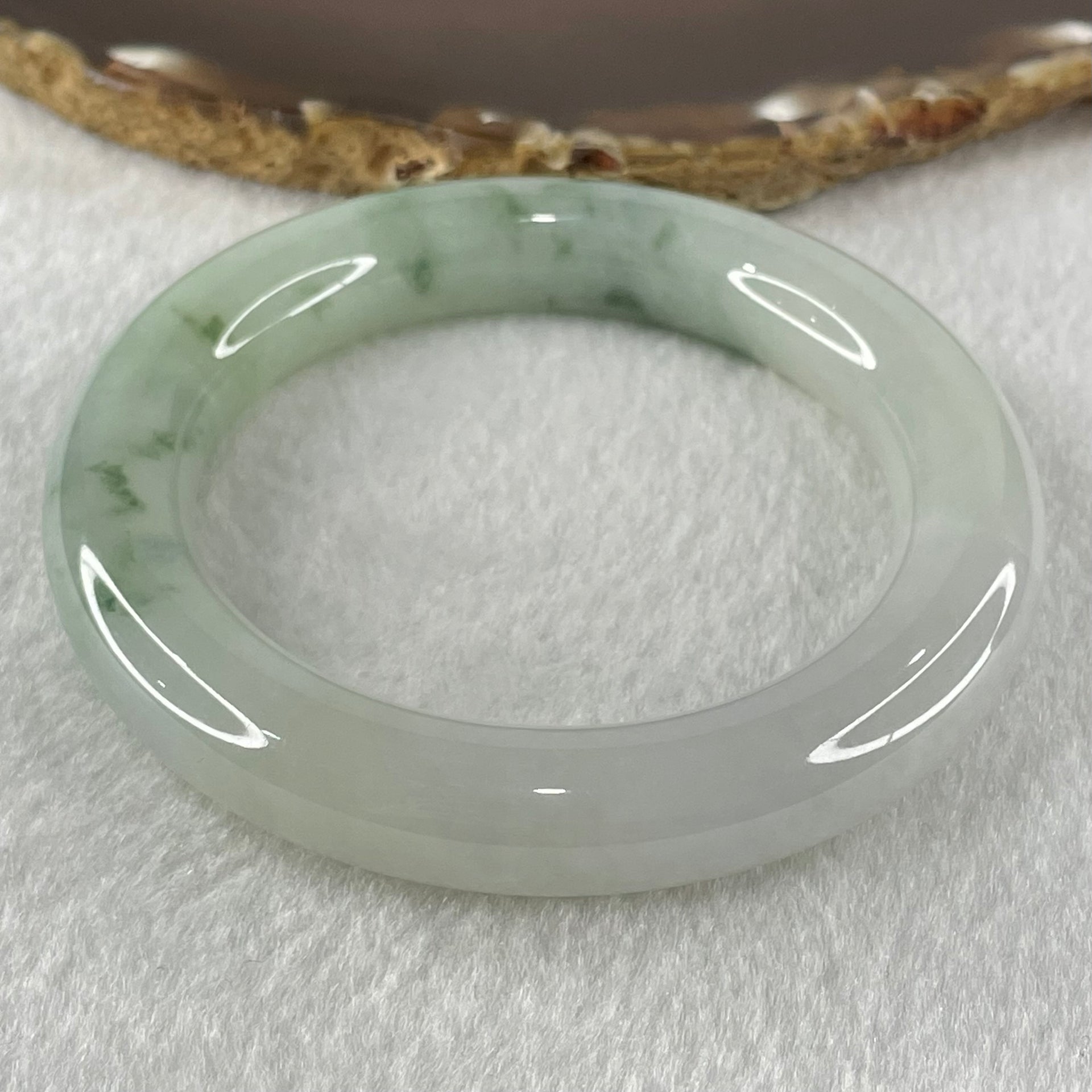Type A Jelly Faint Green with Green Piao Hua Jadeite Bangle 77.72g Internal Diameter 55.4mm 11.8 by 12.0mm (Internal Line) - Huangs Jadeite and Jewelry Pte Ltd