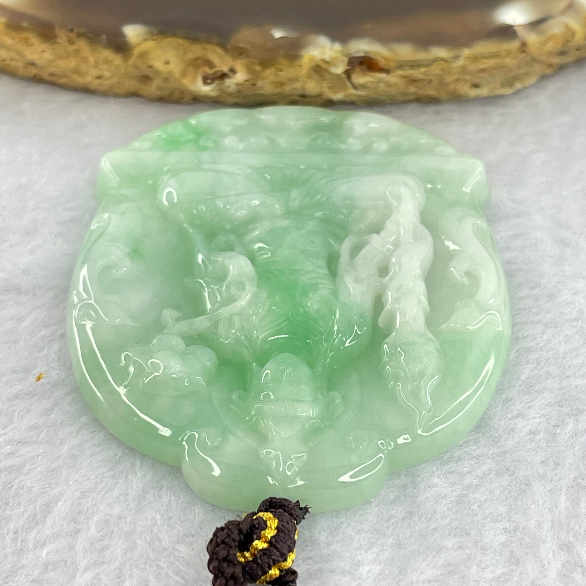 Type A Light Green with Apple Green Jadeite Guan Yin Bodhisattva Pendant 25.90g 53.3 by 44.5 by 6.2mm - Huangs Jadeite and Jewelry Pte Ltd
