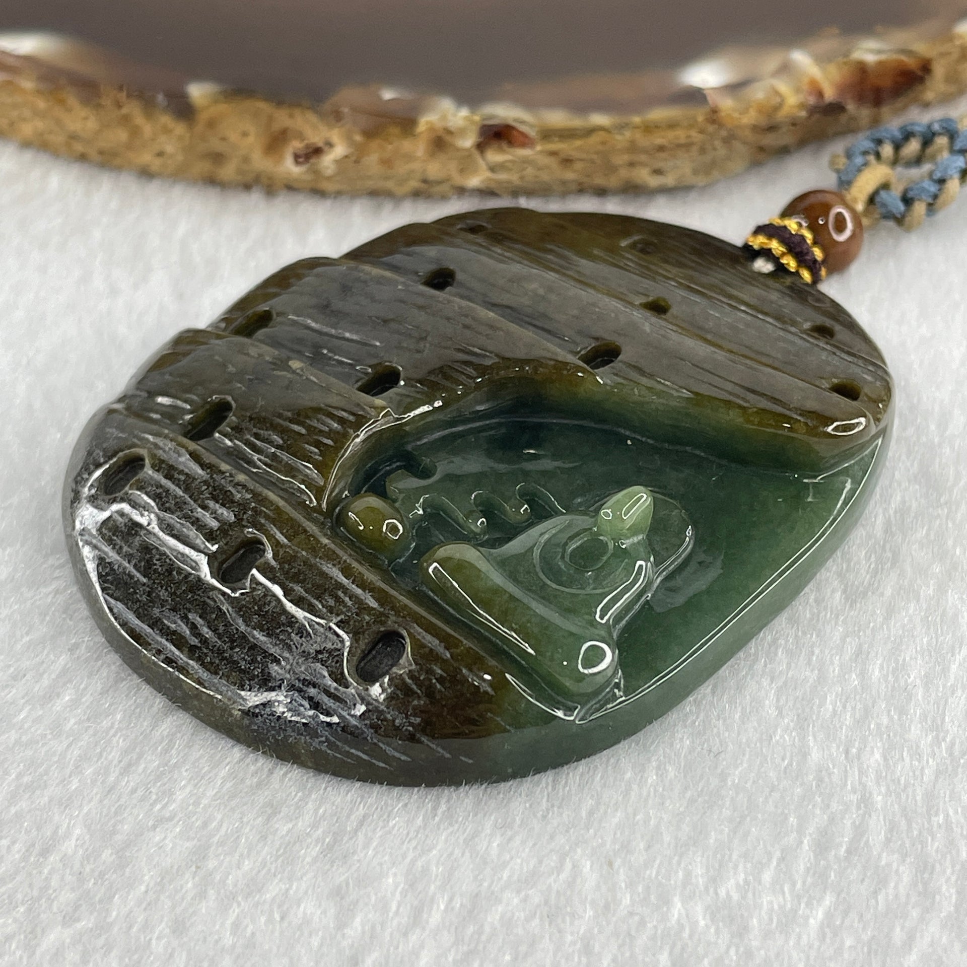 Natural Type A Brown with Blueish Green Jadeite Seeking Enlightenment Pendant 64.41g 63.8 by 51.7 by 10.9mm - Huangs Jadeite and Jewelry Pte Ltd