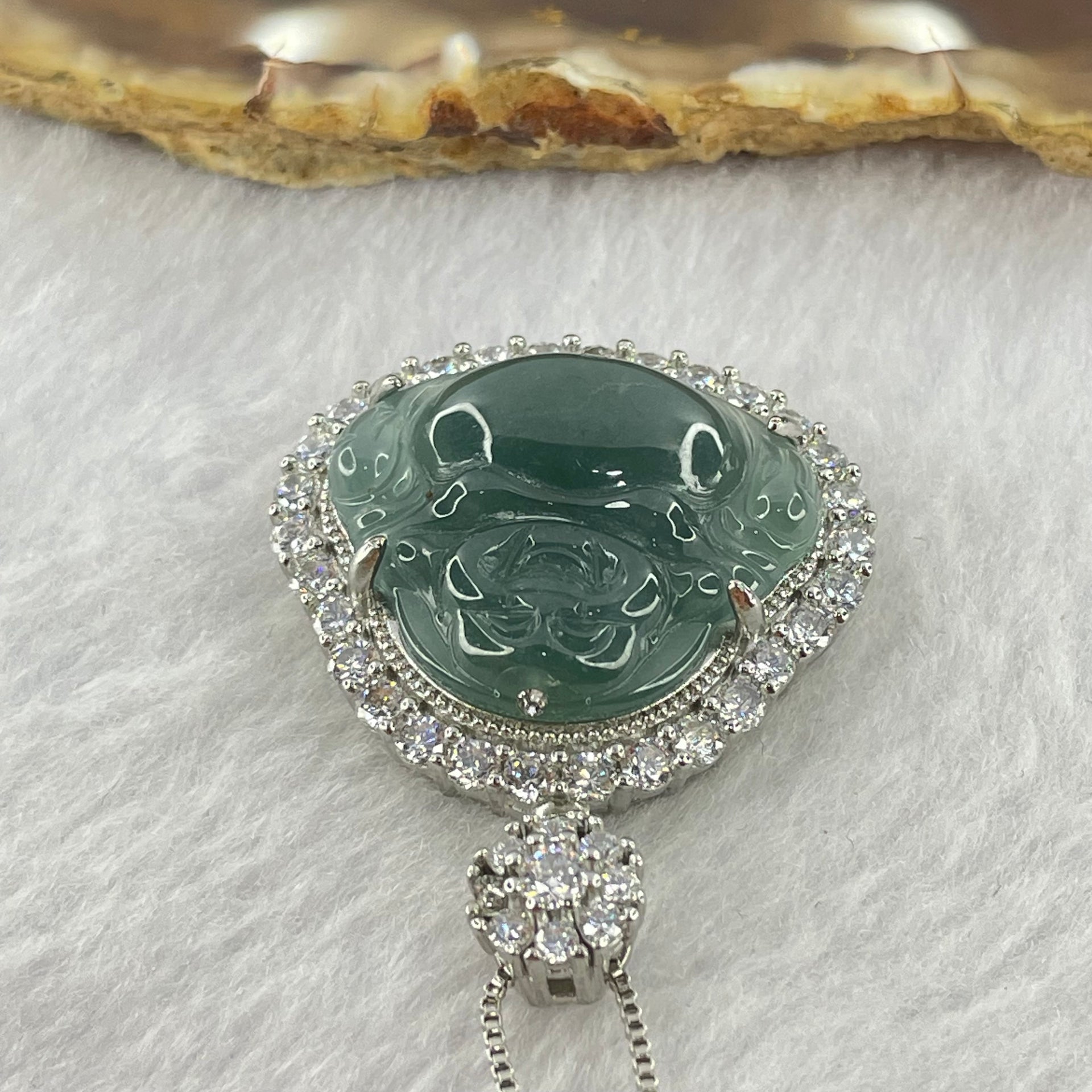 Type A Icy Blueish Green Jadeite Milo Buddha Pendent with Crystals in S925 Sliver Setting and Chain 11.73g 20.8 by 23.5 by 3.5mm - Huangs Jadeite and Jewelry Pte Ltd