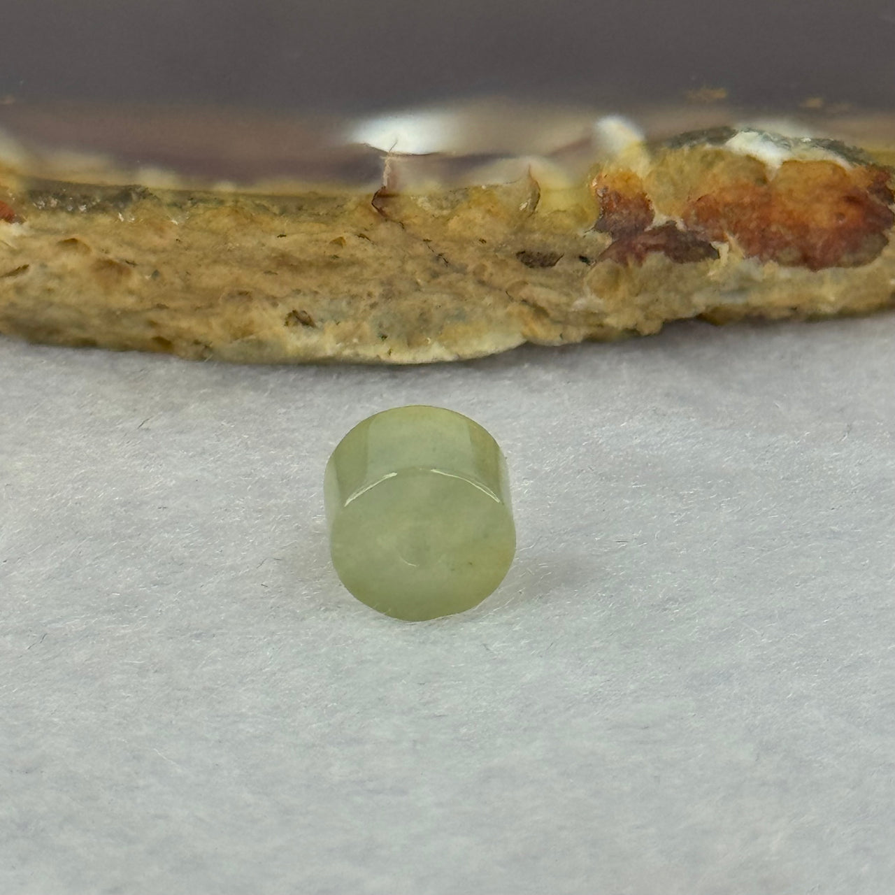 Type A ICY Green Jadeite Bracelet Charm 0.65g 7.4 by 5.1mm - Huangs Jadeite and Jewelry Pte Ltd