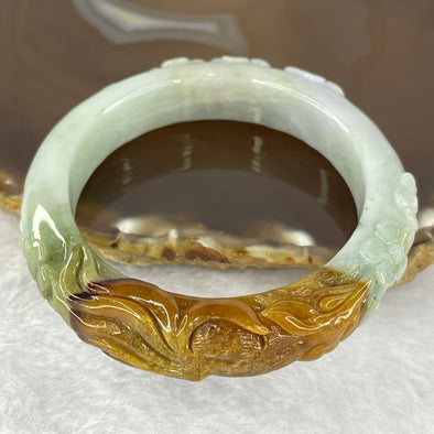 Type A Green with Brown and Lavender Patches Jadeite 9 Tail Fox Flower Bangle for Love Relationship, Third Party Prevention and Prosperity 九尾狐花开富贵61.20g 12.9 by 10.2 mm Internal Diameter 53.0 mm - Huangs Jadeite and Jewelry Pte Ltd